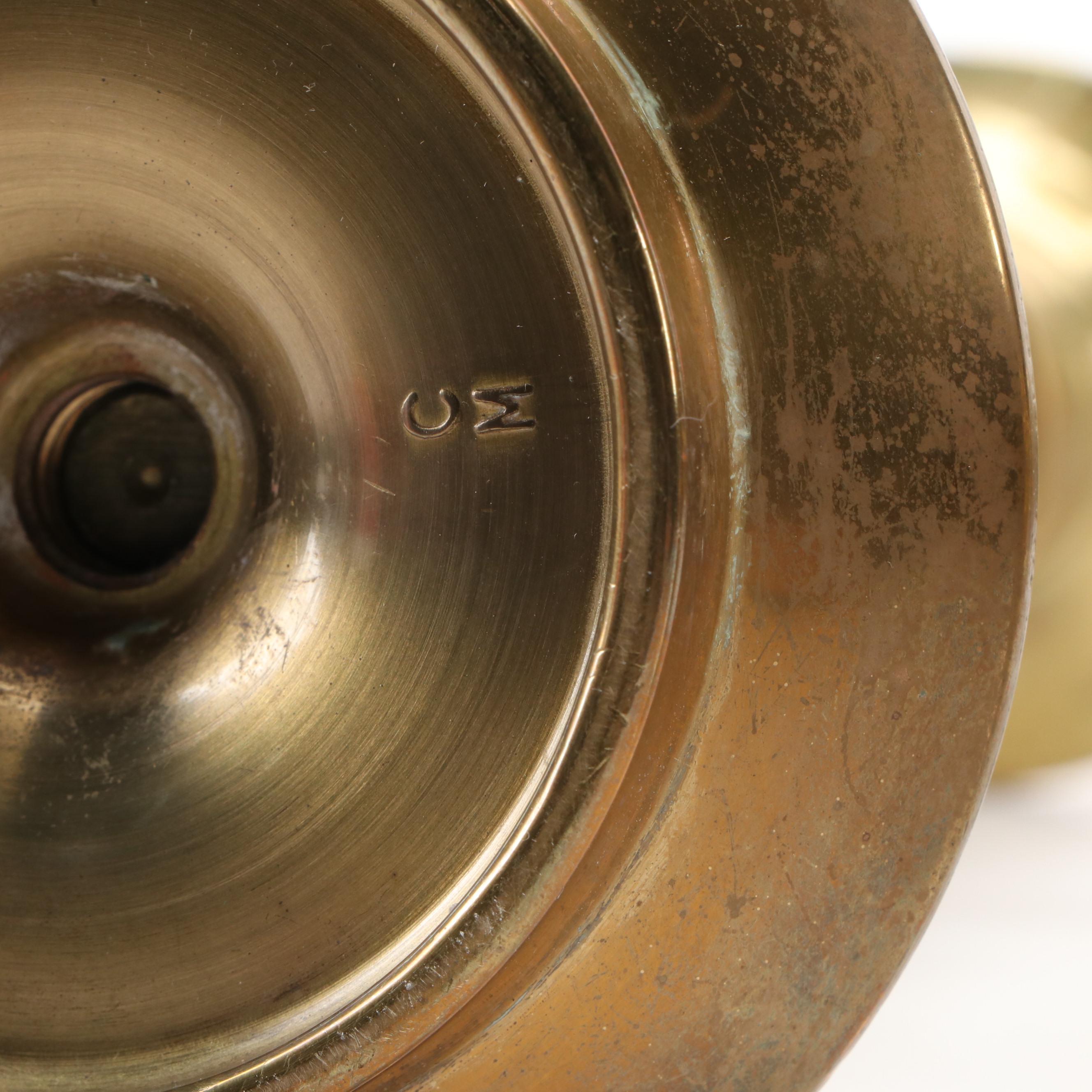 Federal Style Push-Up Chamberstick with Other Brass Candlesticks