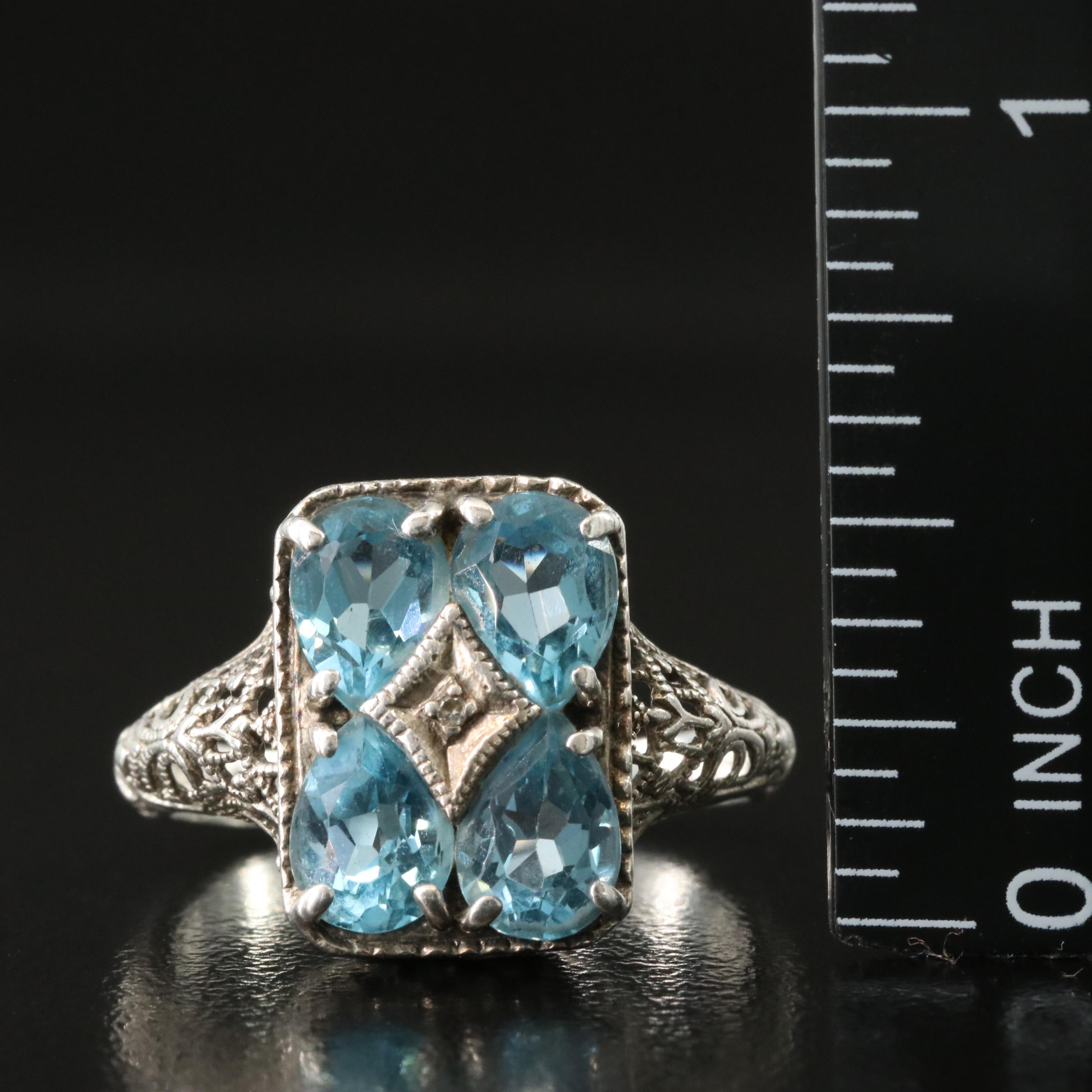 Sterling Blue Topaz and Diamond Ring