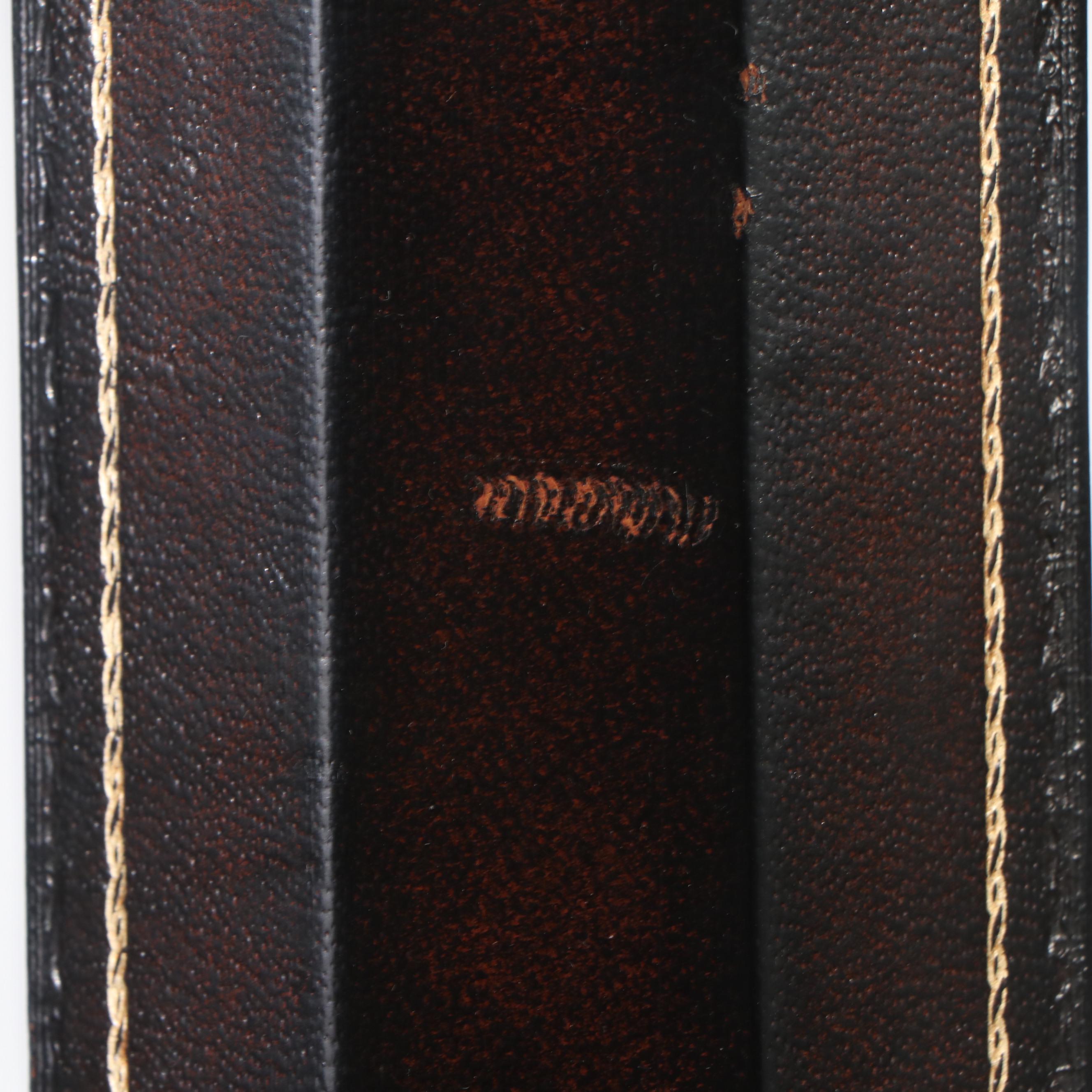 Directoire Style Embossed Faux Leather and Glass Illuminated Cabinet