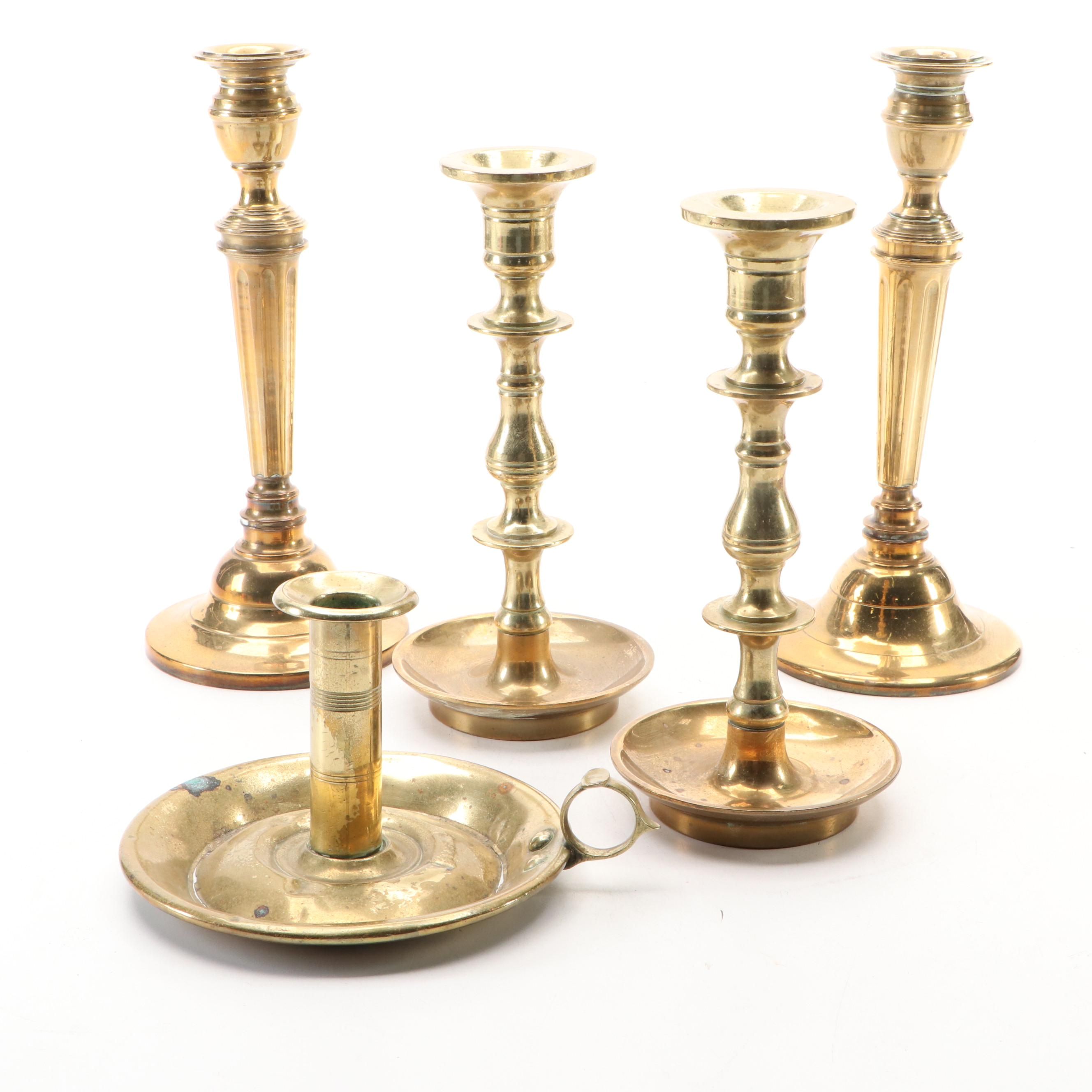 Federal Style Push-Up Chamberstick with Other Brass Candlesticks