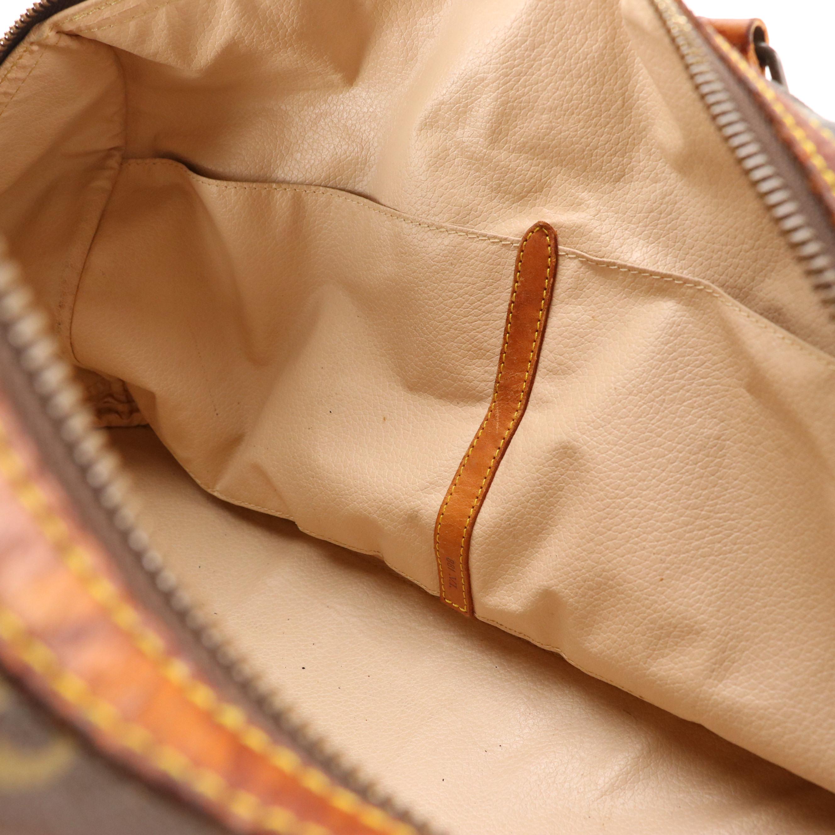 Louis Vuitton Sac Sport Travel Bag in Monogram Coated Canvas and Leather Trim