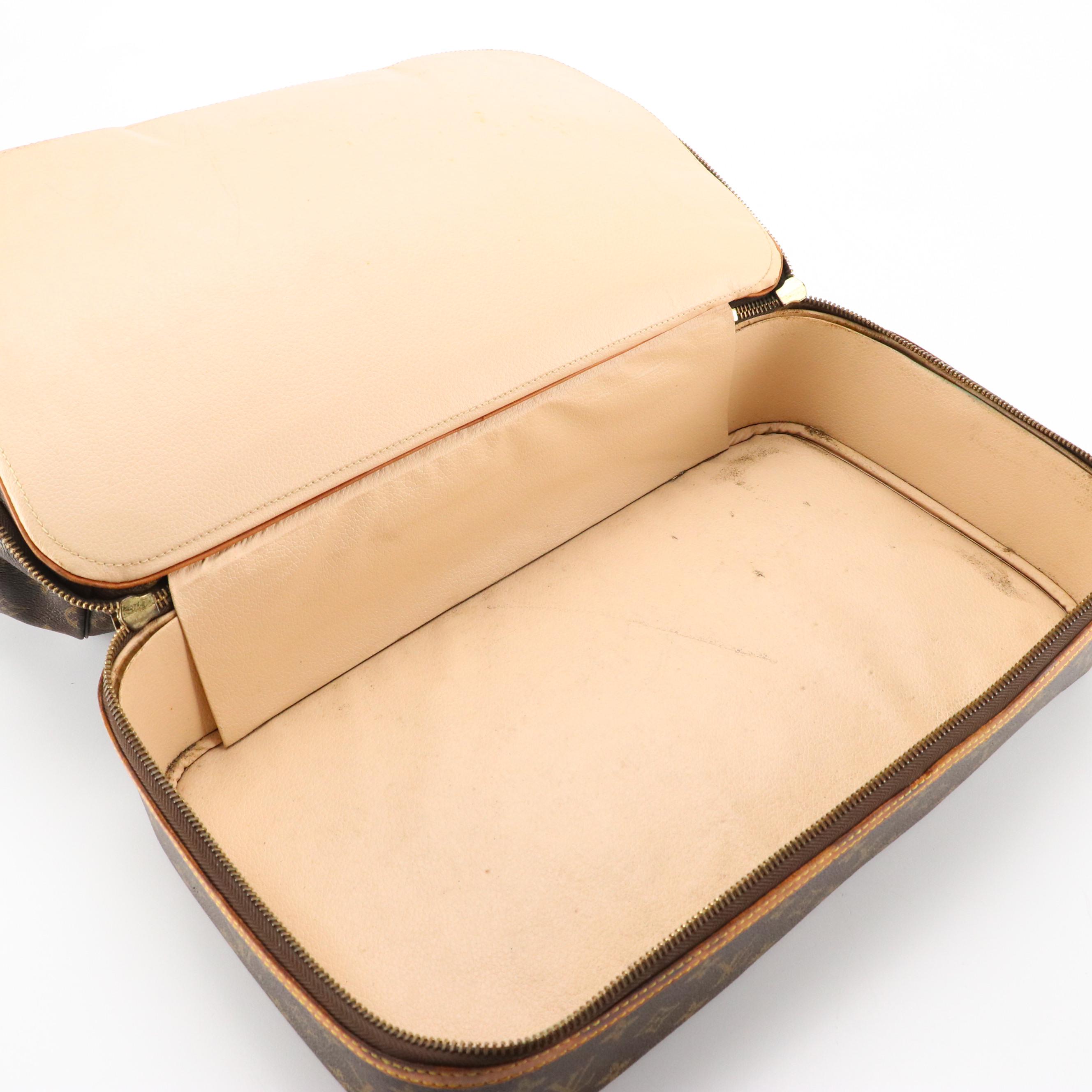 Louis Vuitton Sac Sport Travel Bag in Monogram Coated Canvas and Leather Trim