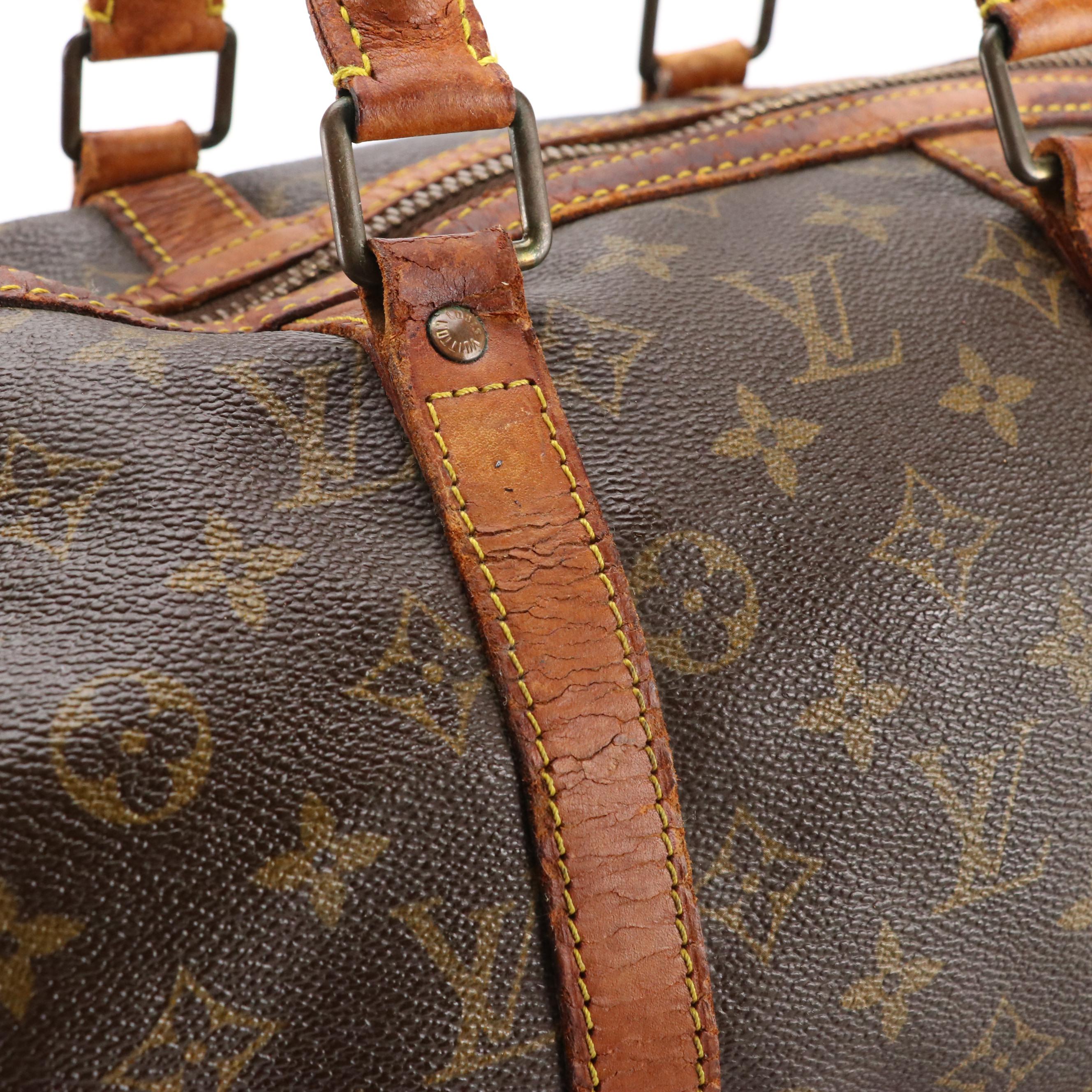 Louis Vuitton Sac Sport Travel Bag in Monogram Coated Canvas and Leather Trim