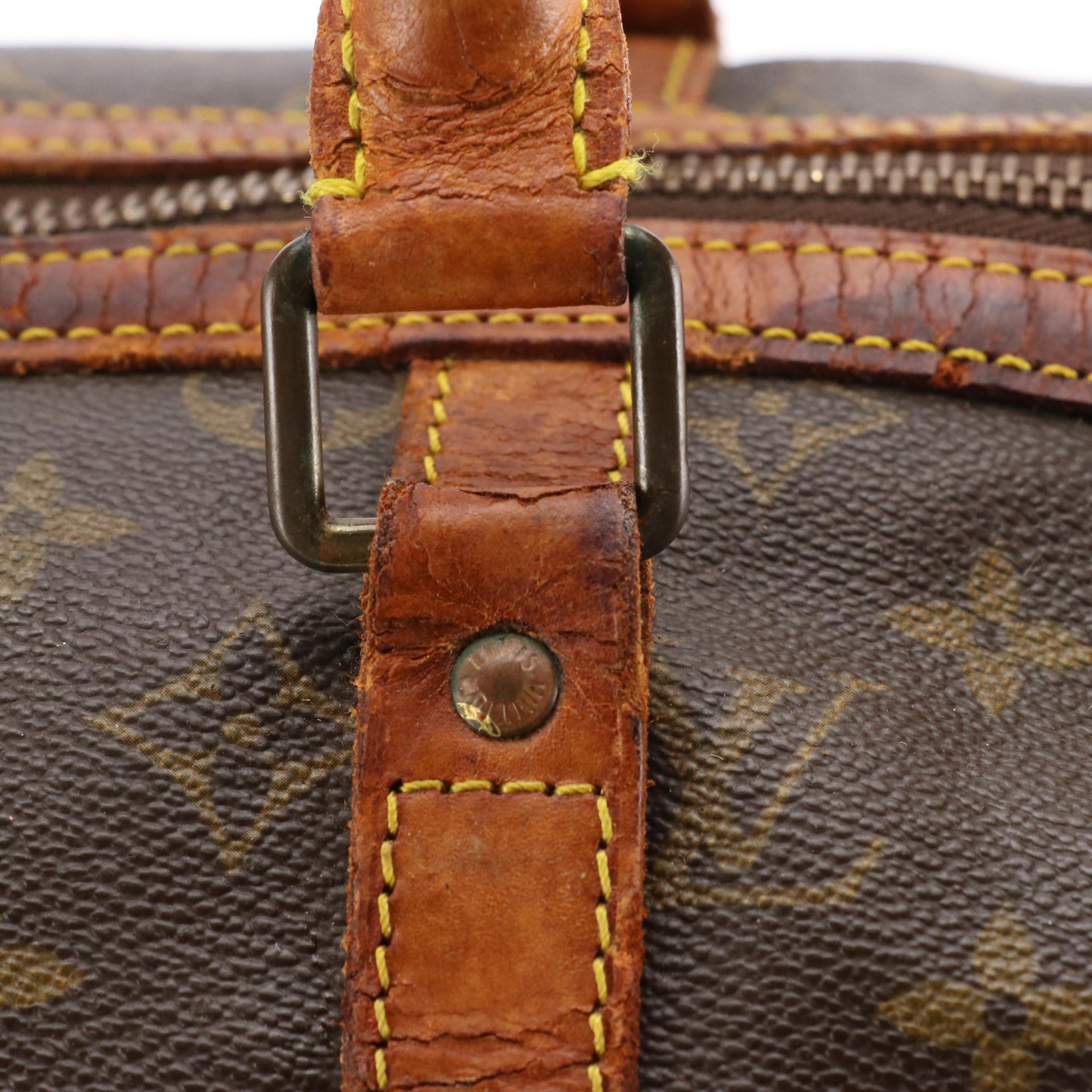 Louis Vuitton Sac Sport Travel Bag in Monogram Coated Canvas and Leather Trim