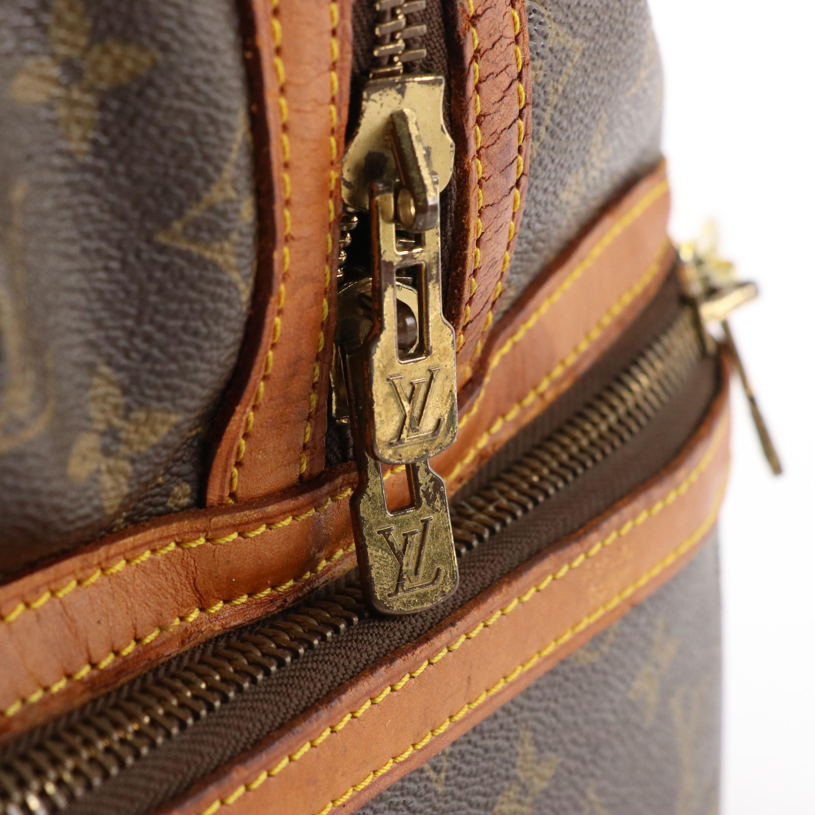 Louis Vuitton Sac Sport Travel Bag in Monogram Coated Canvas and Leather Trim