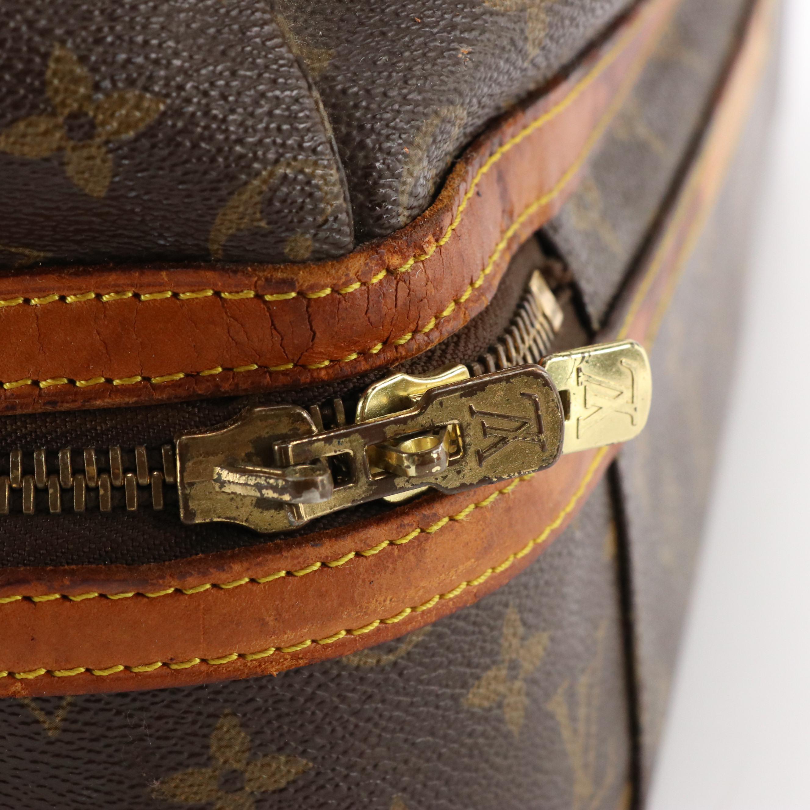 Louis Vuitton Sac Sport Travel Bag in Monogram Coated Canvas and Leather Trim