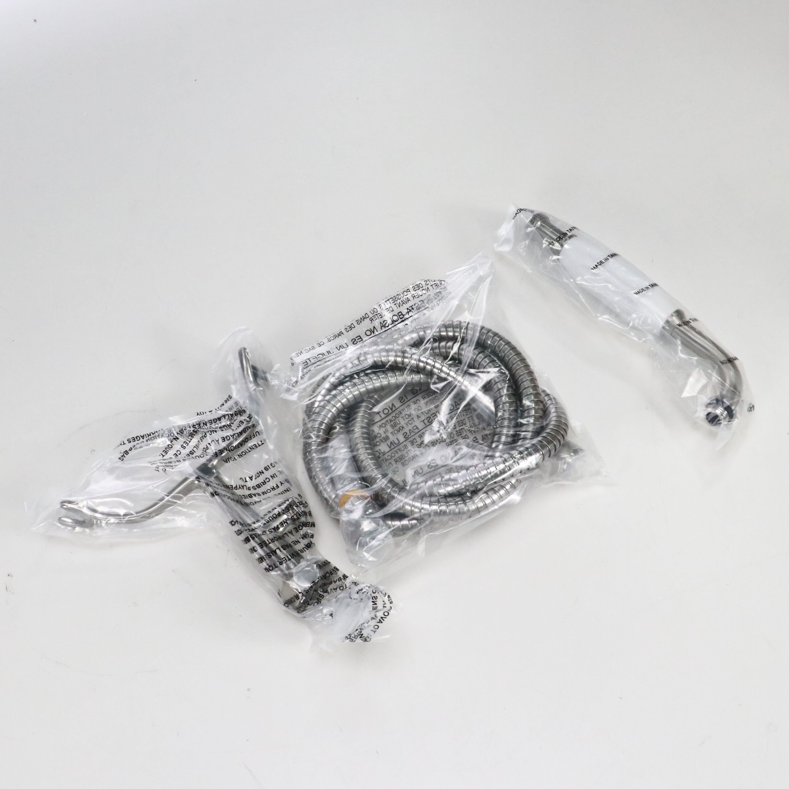 Contemporary Bathroom Faucet, Shower Curtain Rod, and Other Hardware