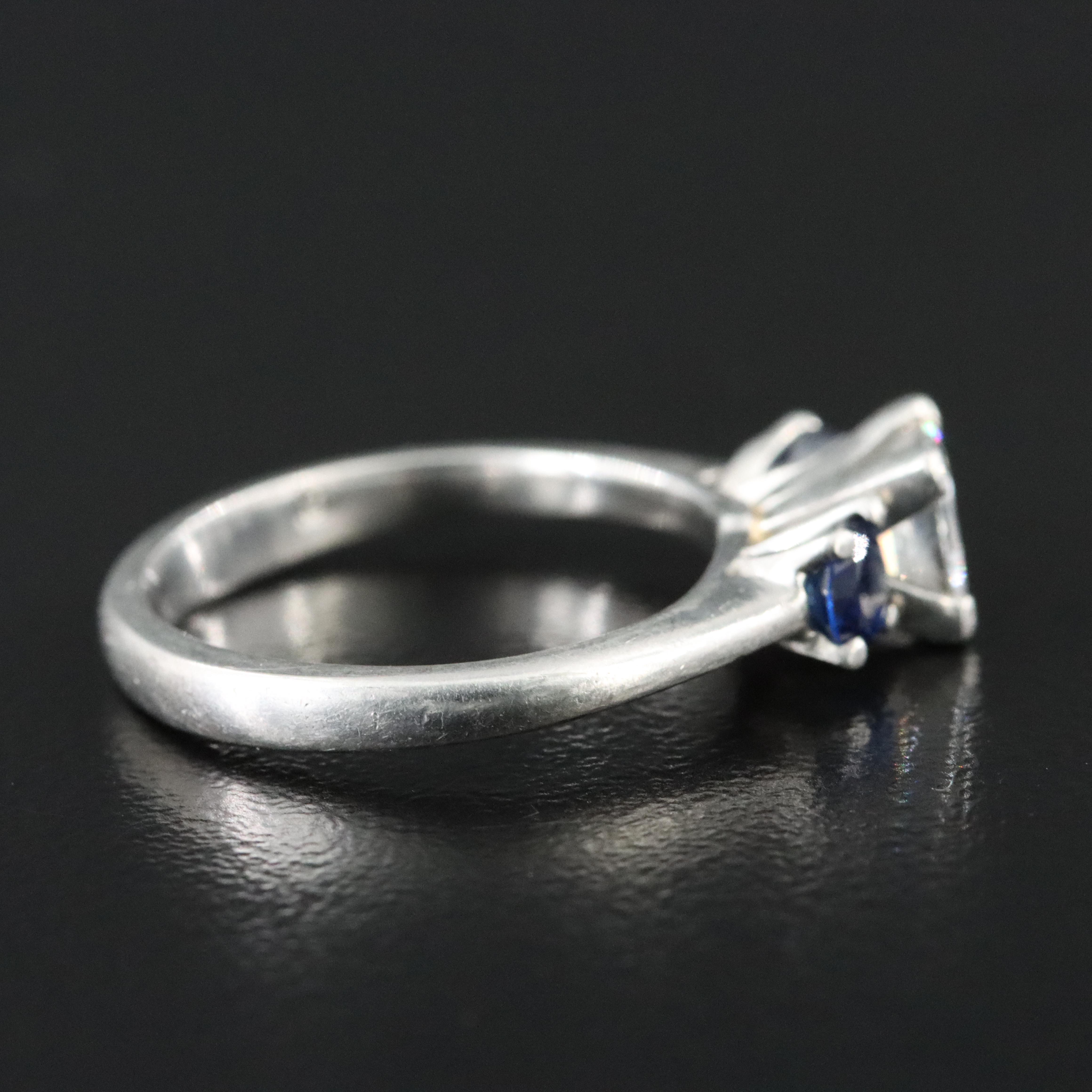 Platinum .71 CTW Diamond and Sapphire Ring with GIA Report