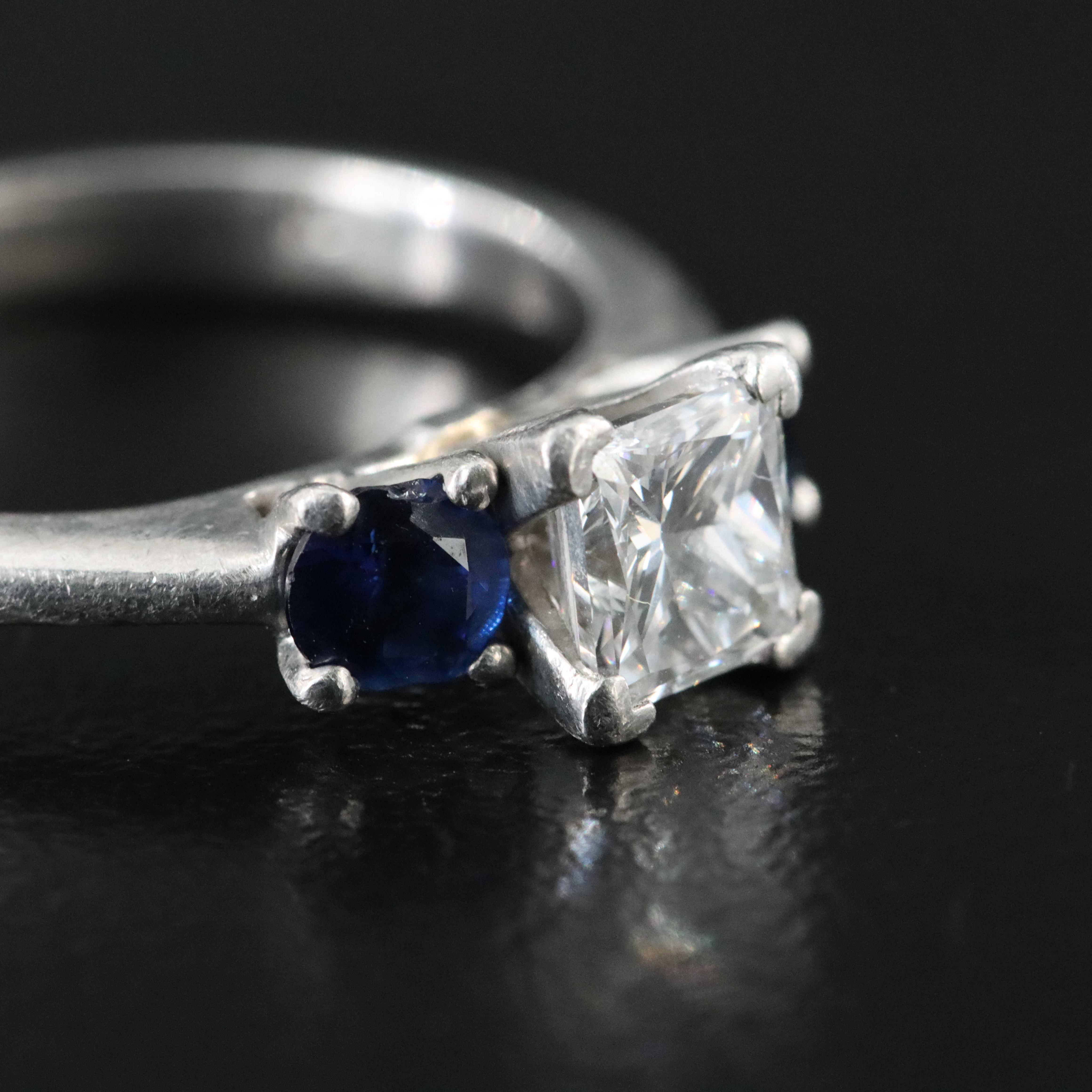 Platinum .71 CTW Diamond and Sapphire Ring with GIA Report