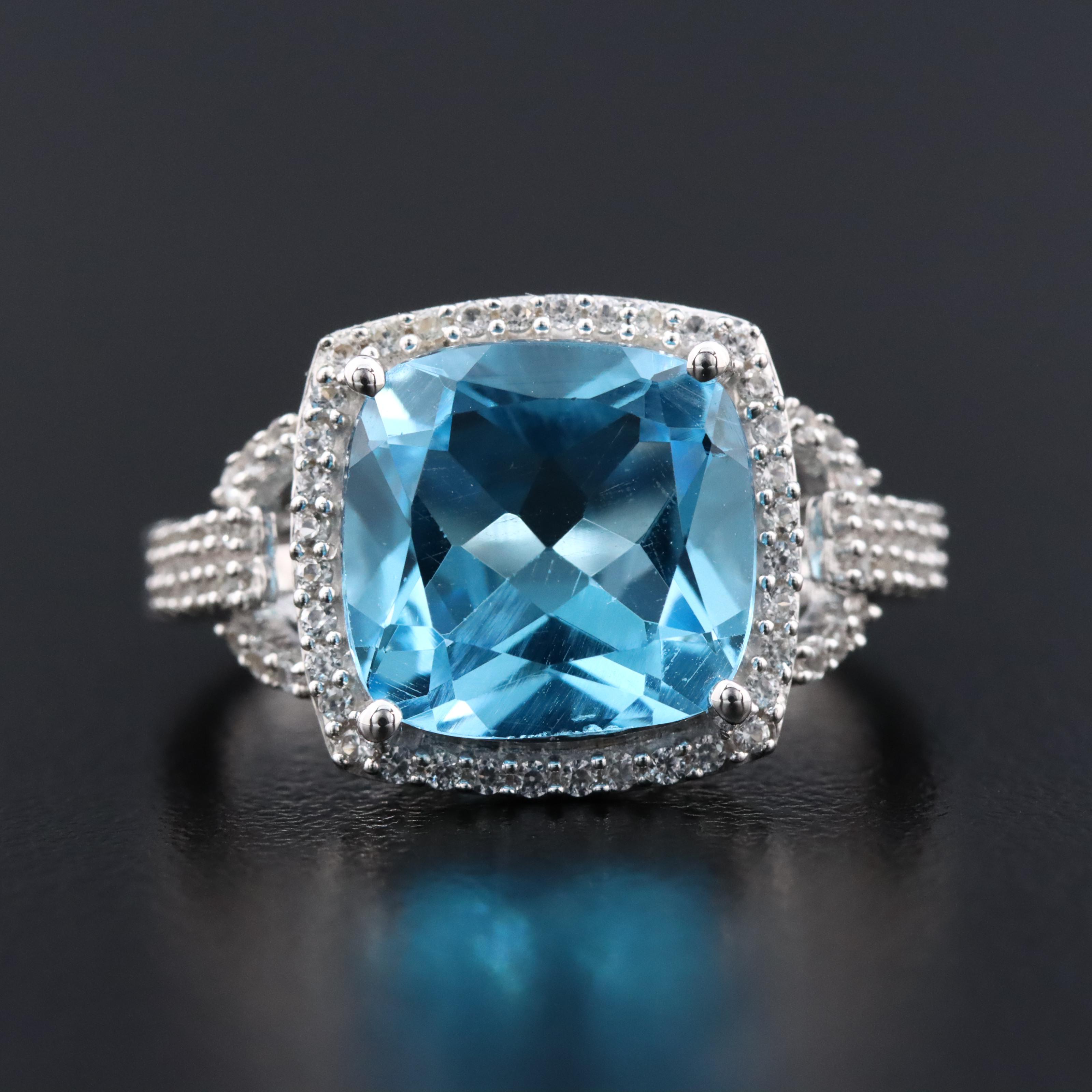 Sterling Swiss Blue Topaz and Sapphire Halo Ring