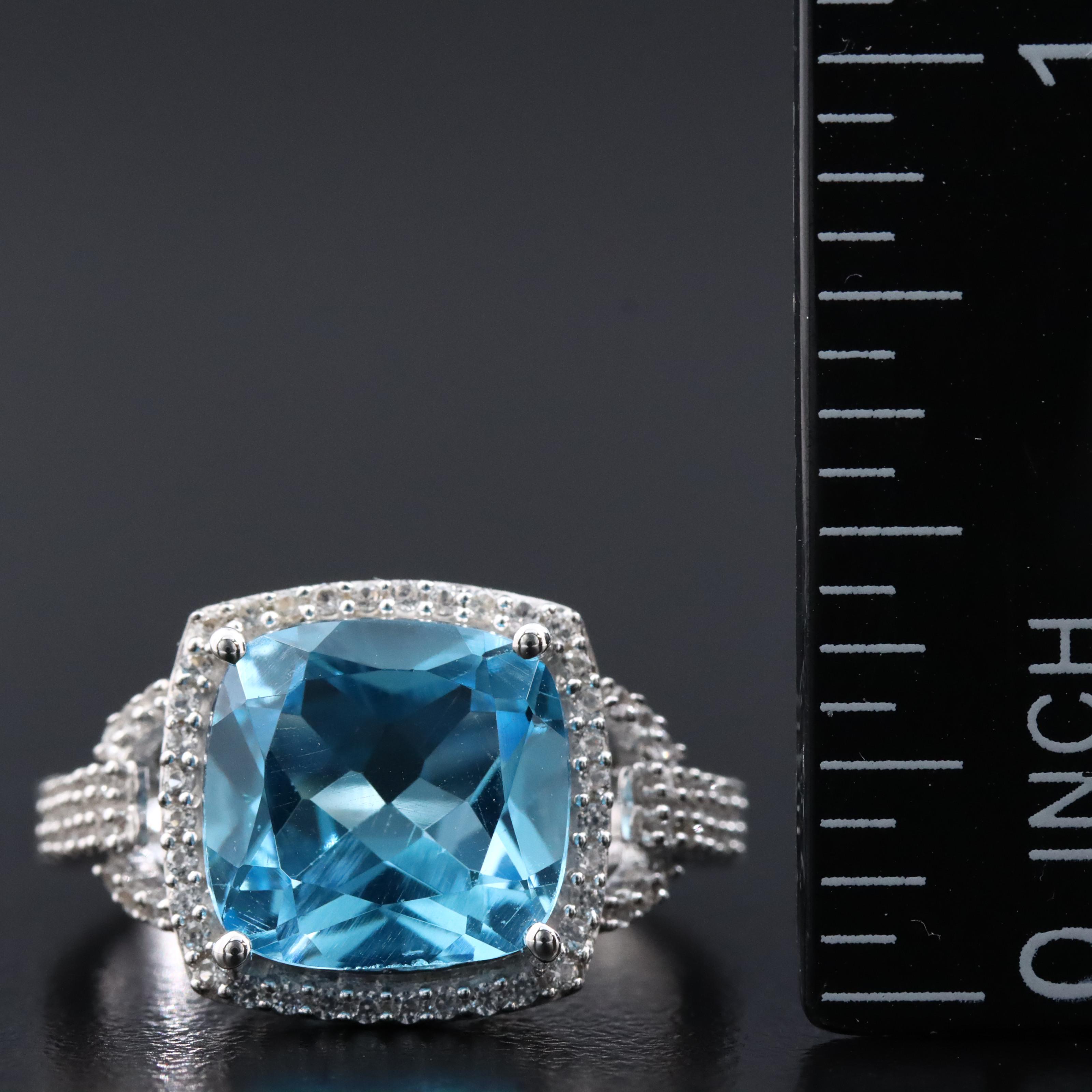 Sterling Swiss Blue Topaz and Sapphire Halo Ring