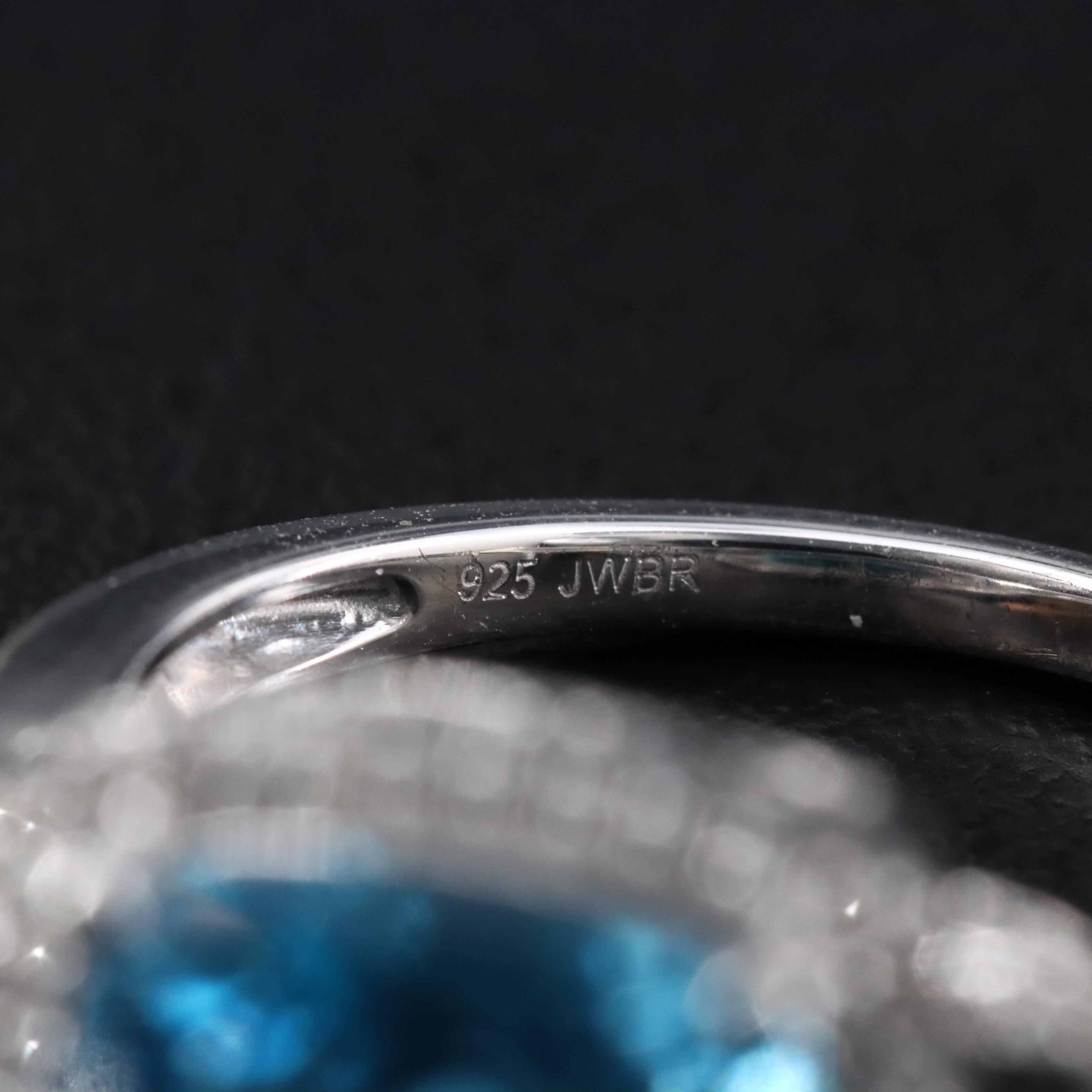 Sterling Swiss Blue Topaz and Sapphire Halo Ring