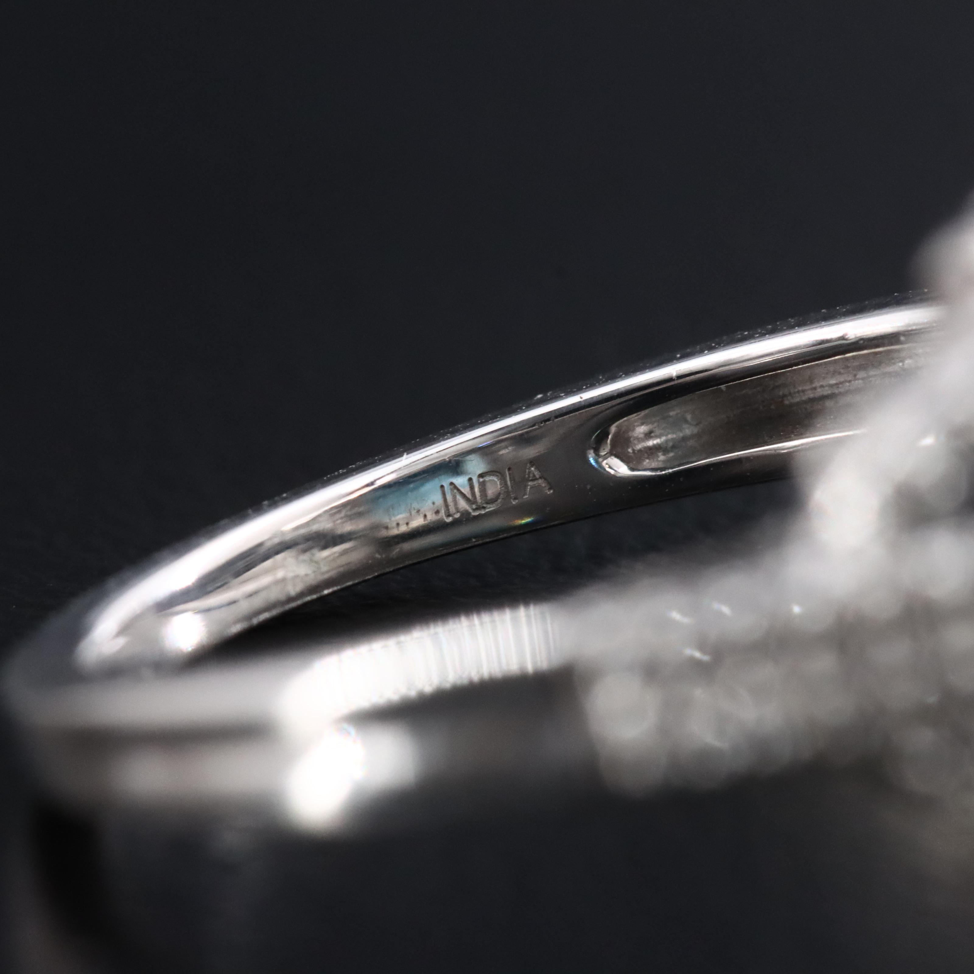 Sterling Swiss Blue Topaz and Sapphire Halo Ring