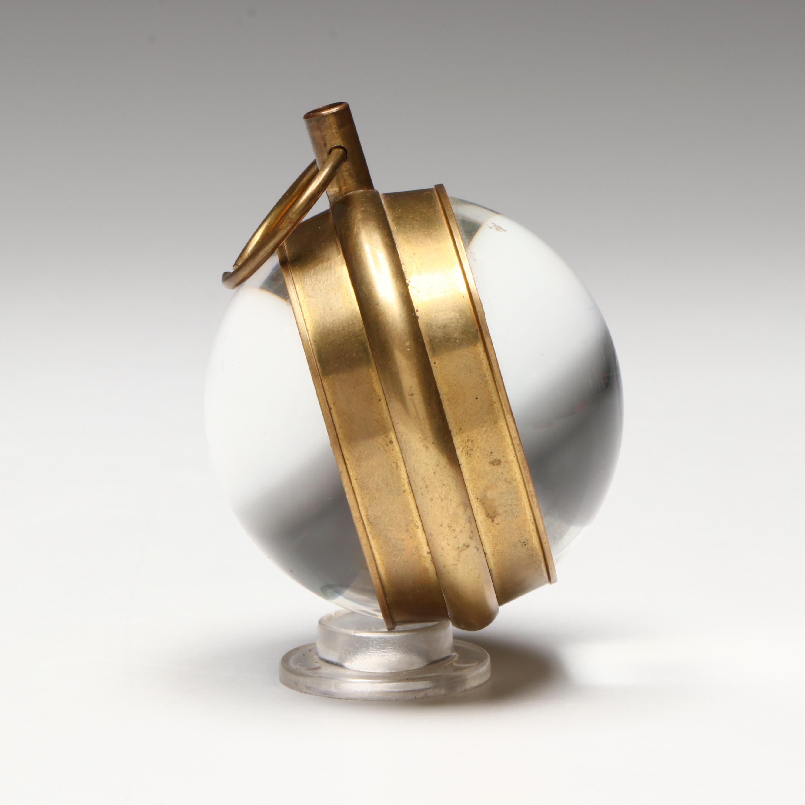 The Kings Brass and Glass Orb Shaped Skeleton Clock, 20th Century