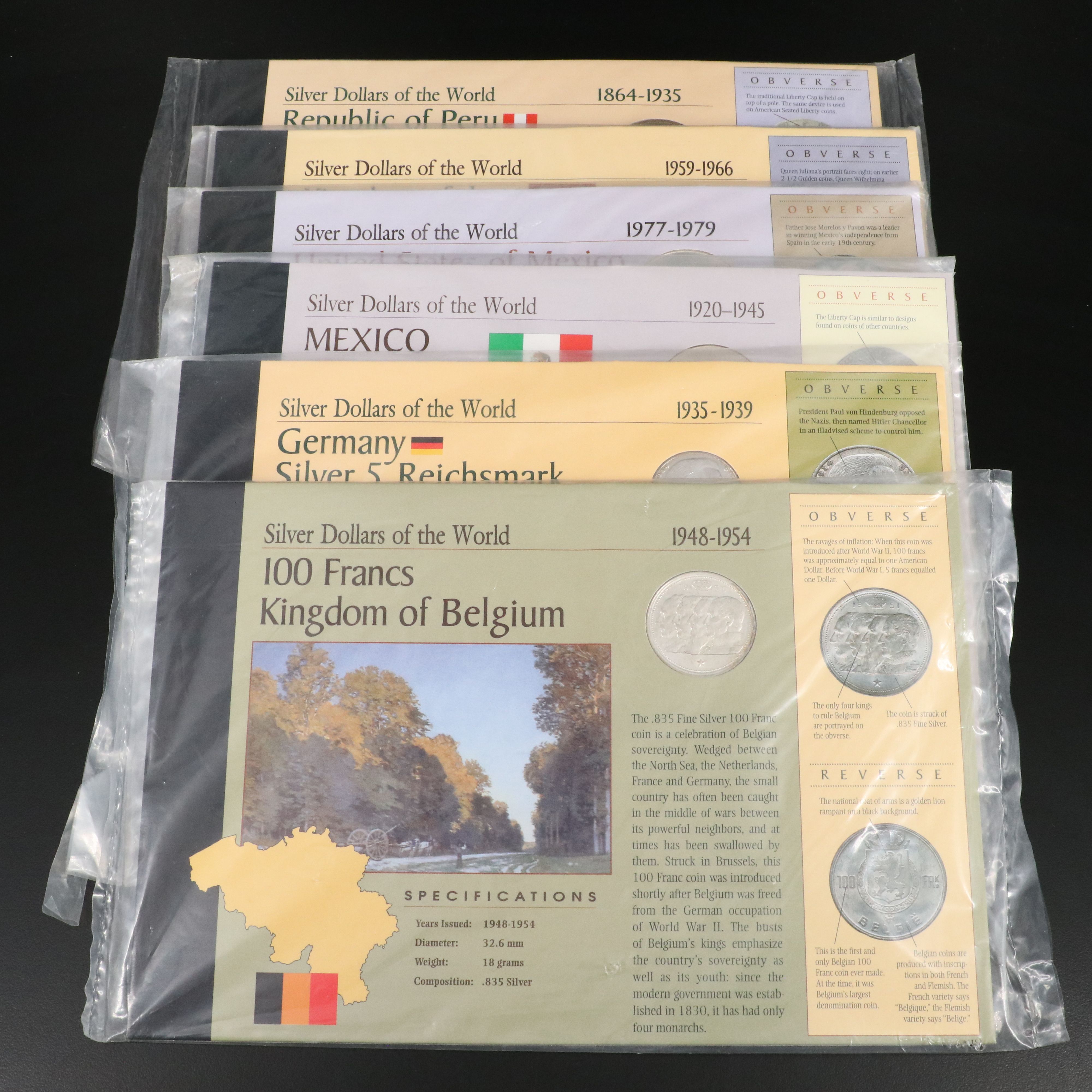 Six "Silver Dollars of the World" Cards by the American Historic Society