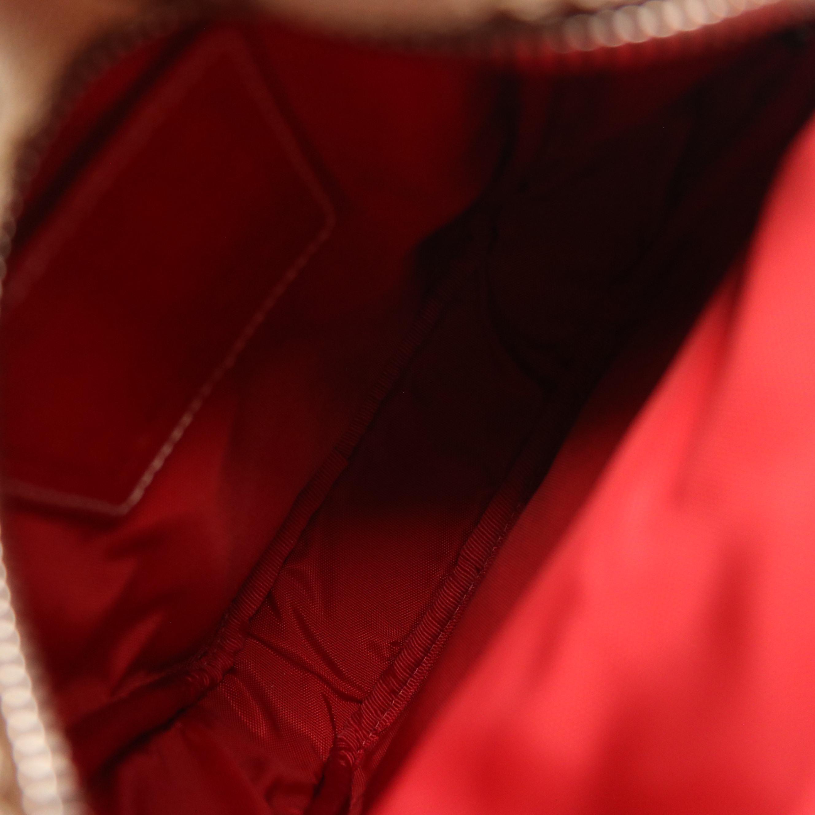 Coach Signature Canvas Sling Bag with Red Leather Trim