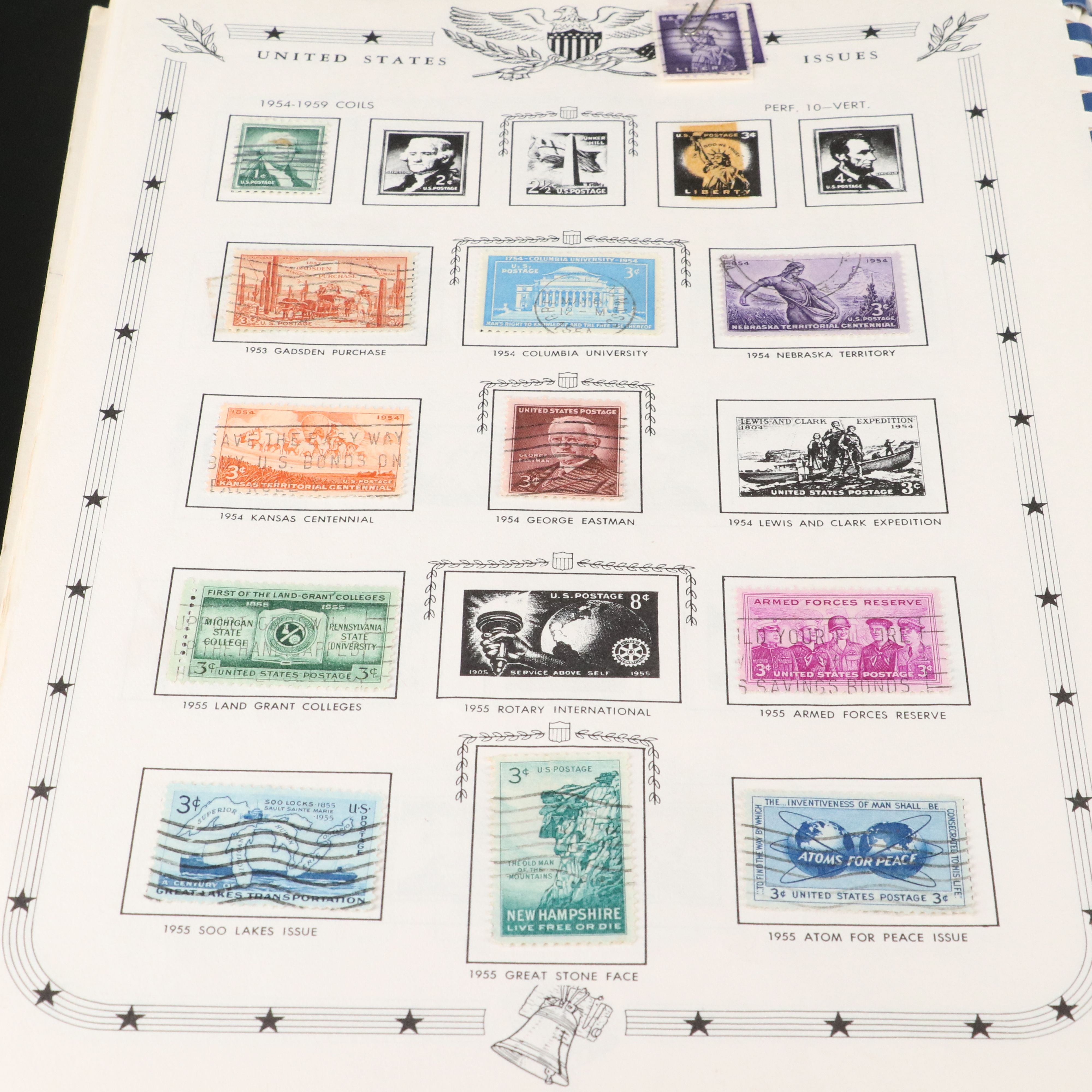 Jefferson United States stamp album and a Mint Roll of State Quarters