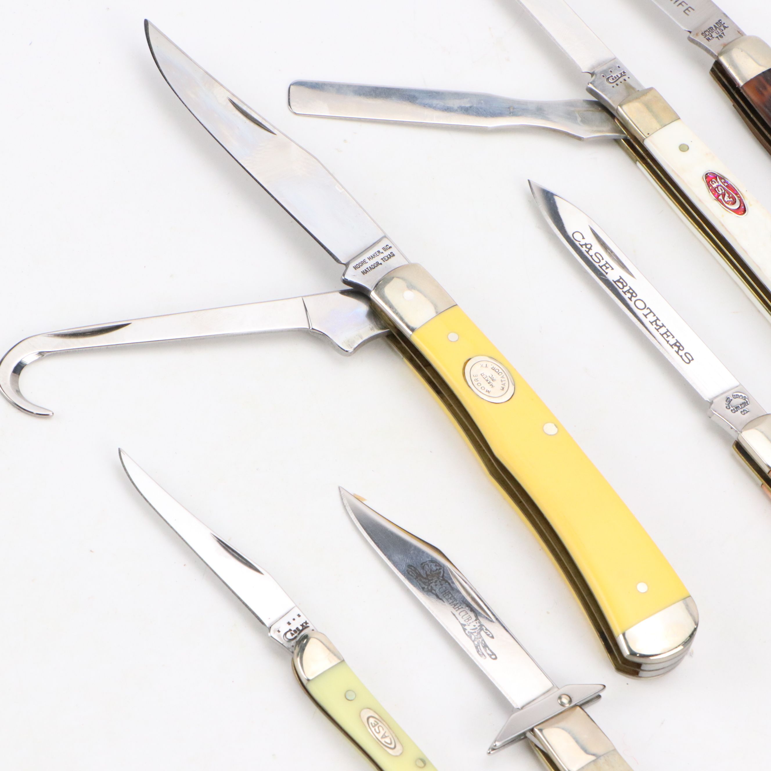 Case "Cheetah Cub" with Remington, Schrade and Moore Maker Folding Knives