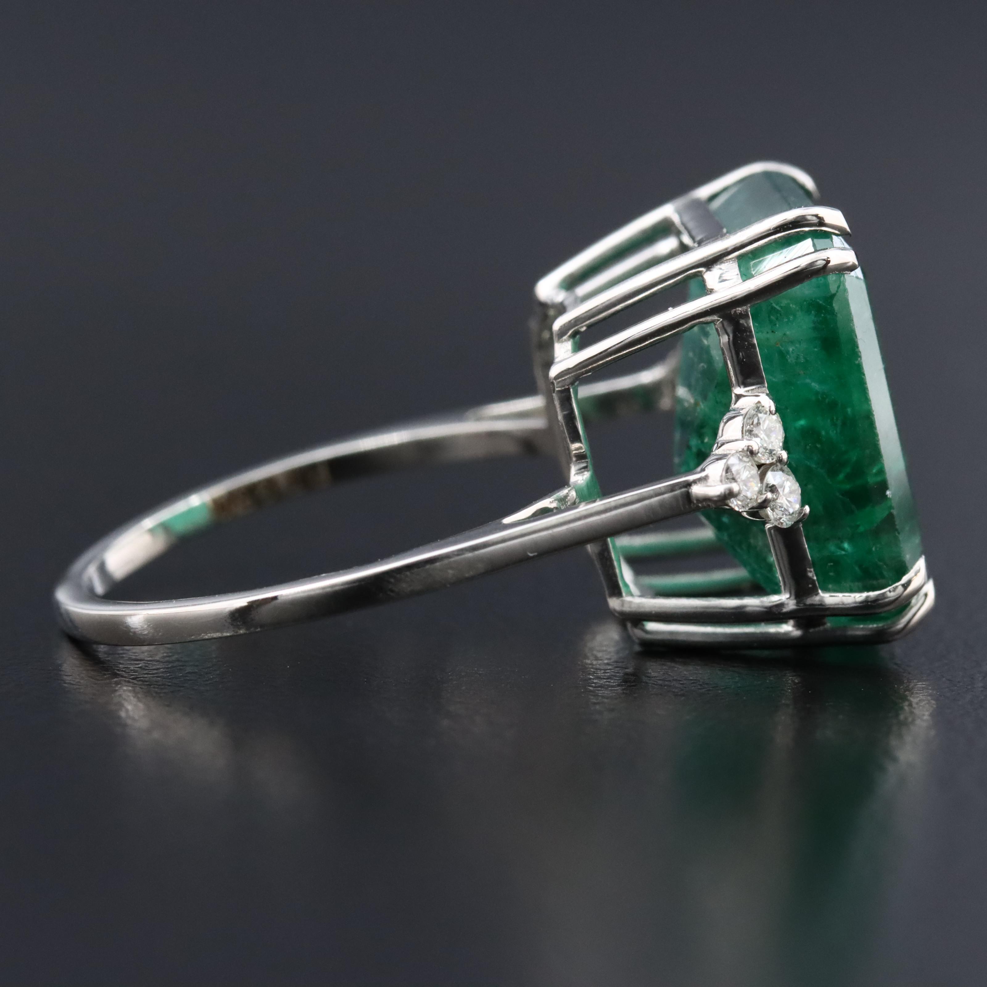 Platinum 10.50 CT Emerald and 0.18 CTW Diamond Ring