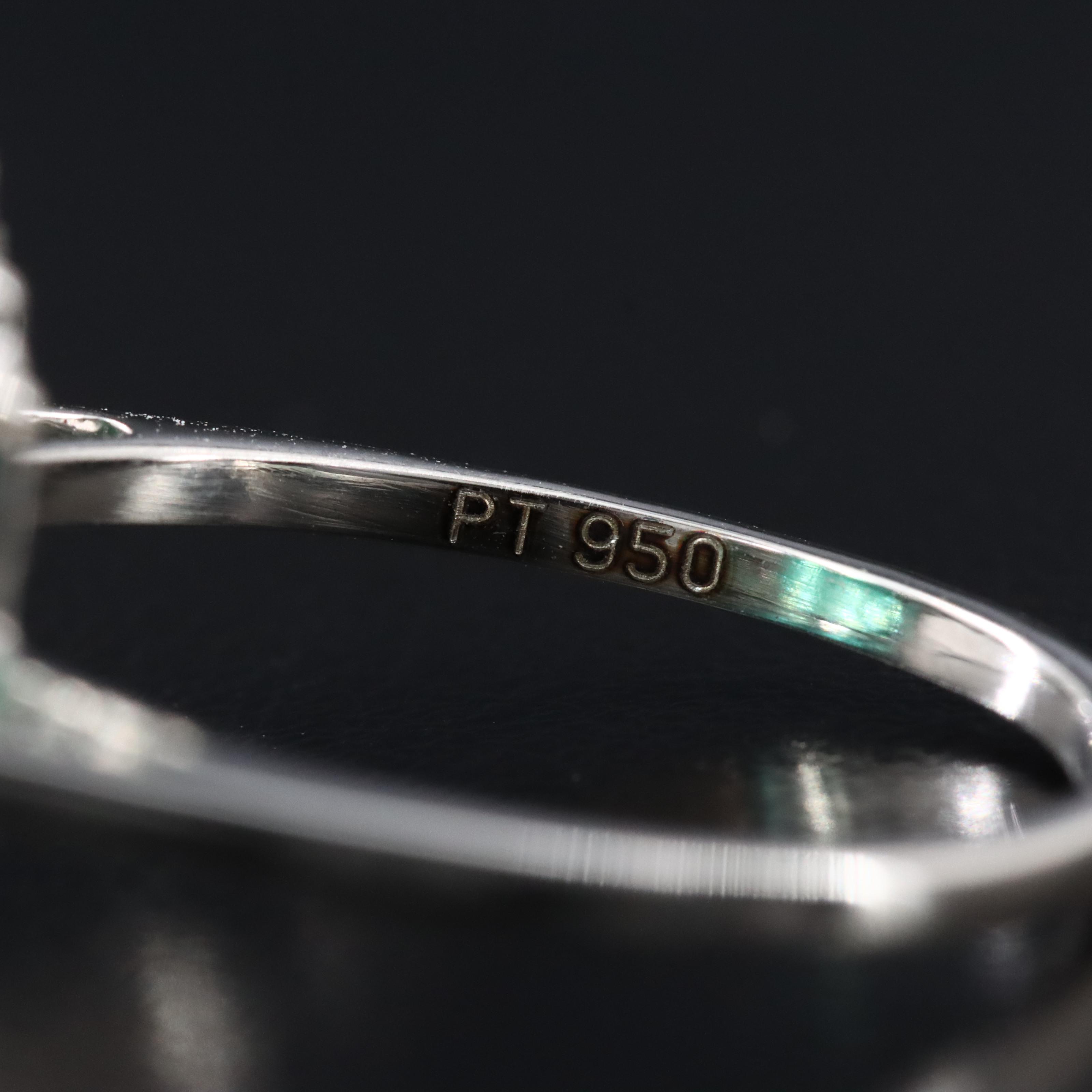 Platinum 10.50 CT Emerald and 0.18 CTW Diamond Ring