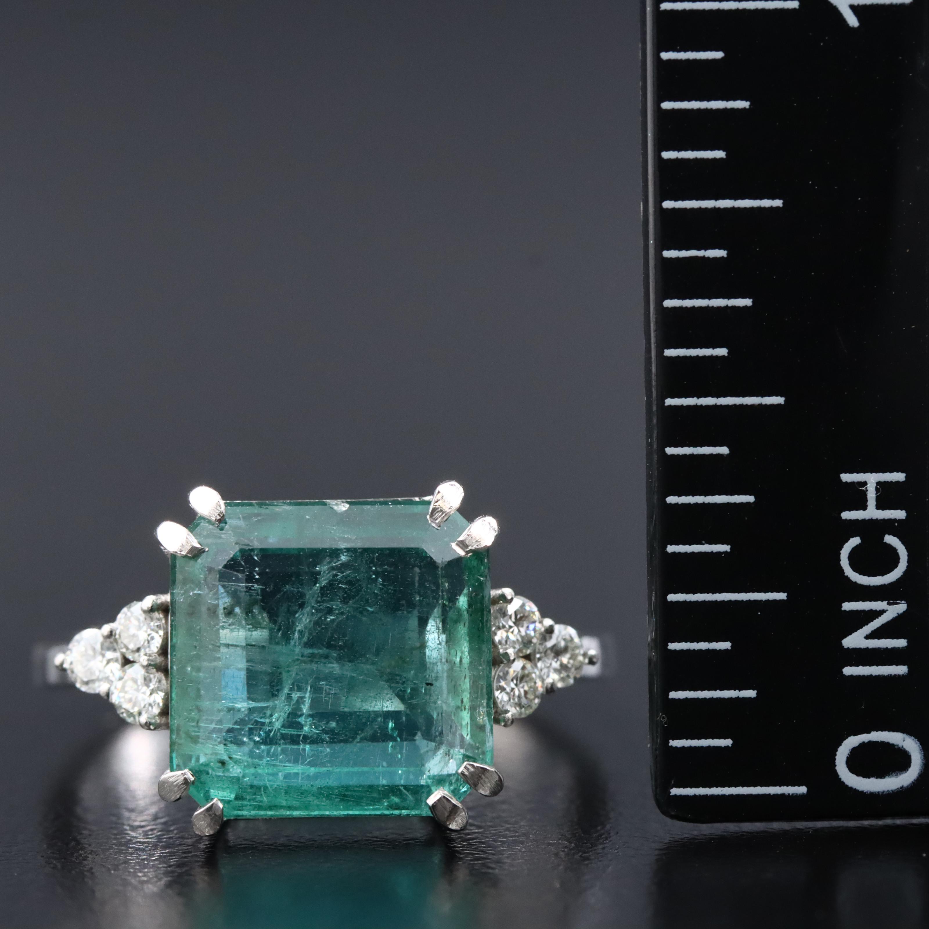 Platinum 5.50 CT Emerald and 0.18 CTW Diamond Ring