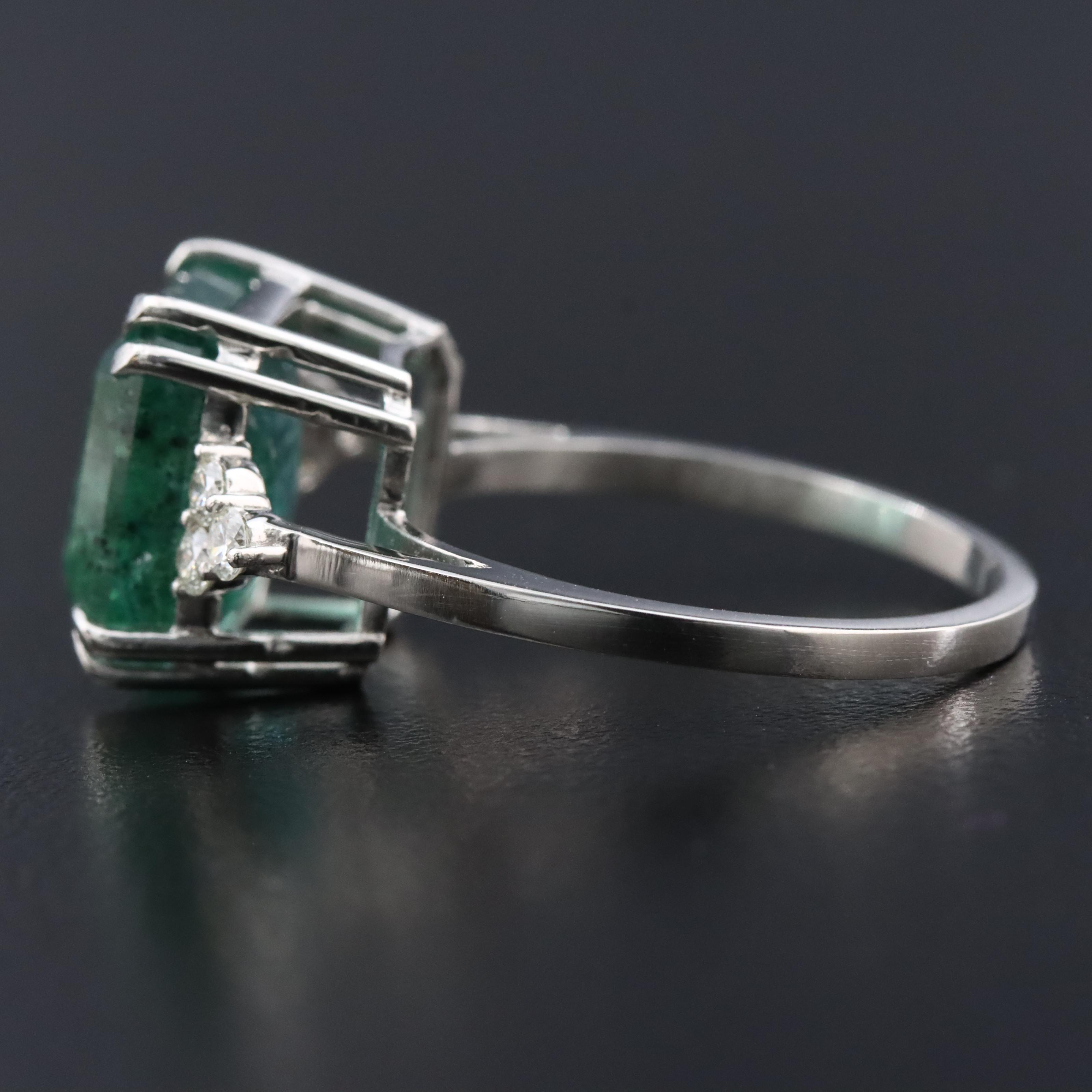 Platinum 5.50 CT Emerald and 0.18 CTW Diamond Ring