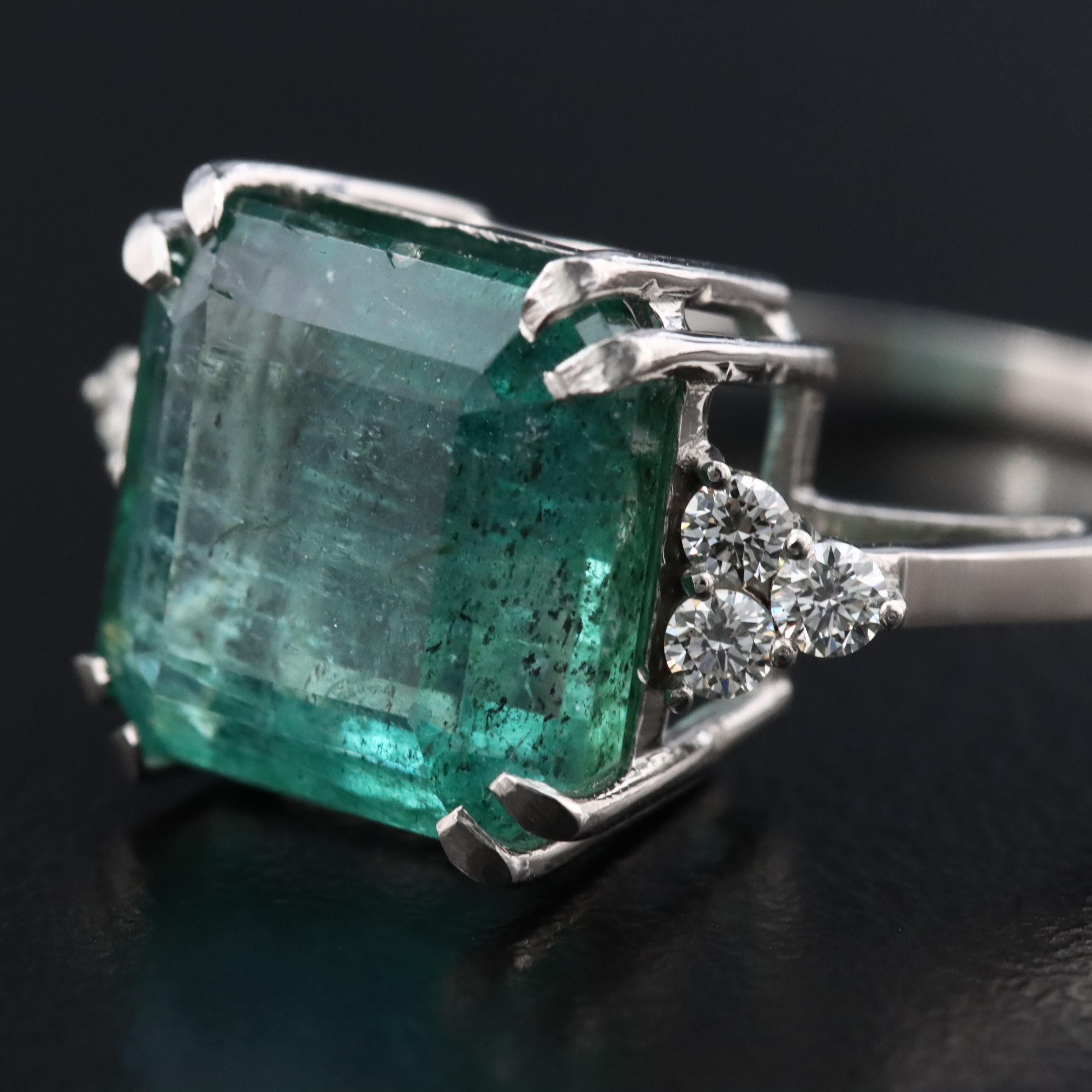 Platinum 5.50 CT Emerald and 0.18 CTW Diamond Ring