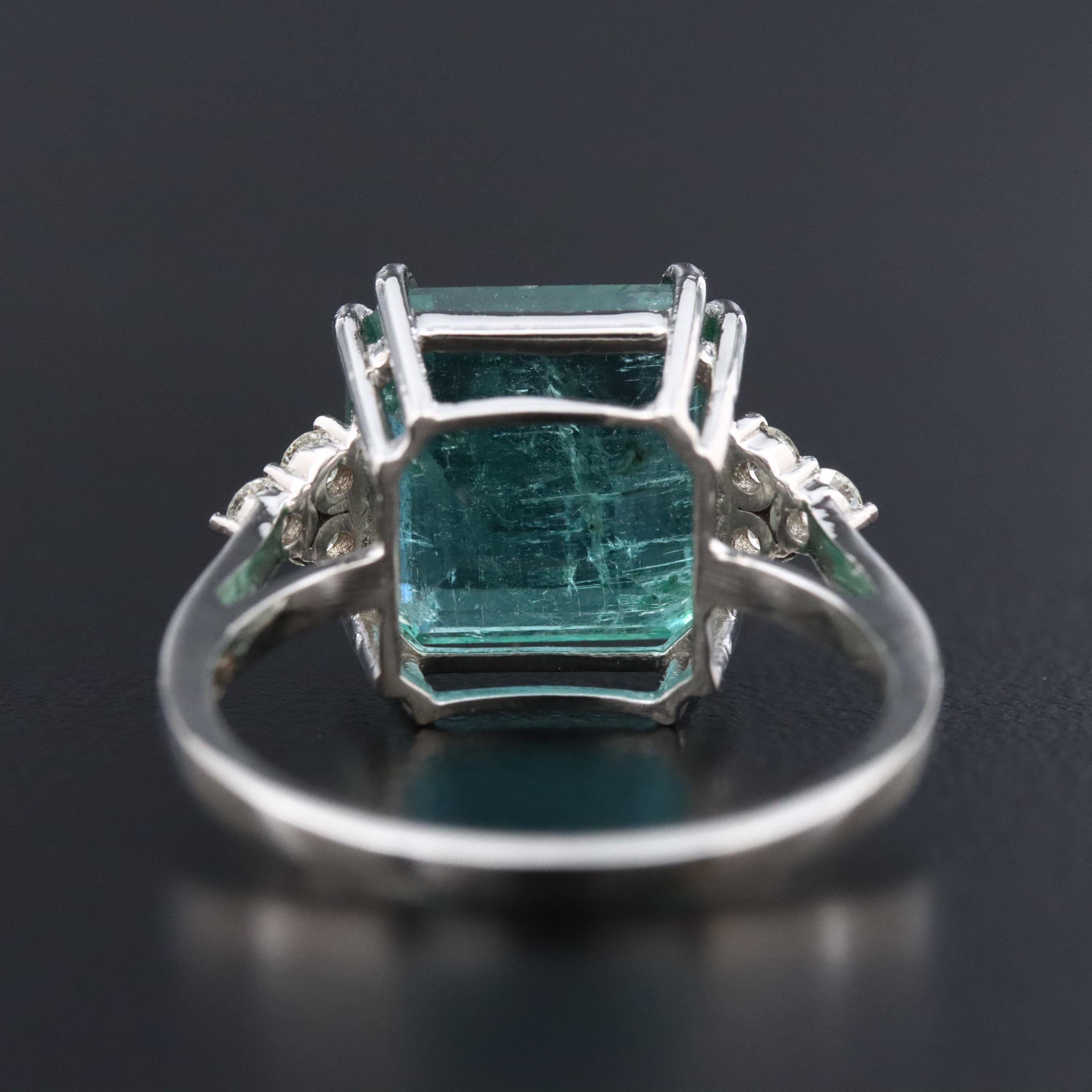 Platinum 5.50 CT Emerald and 0.18 CTW Diamond Ring
