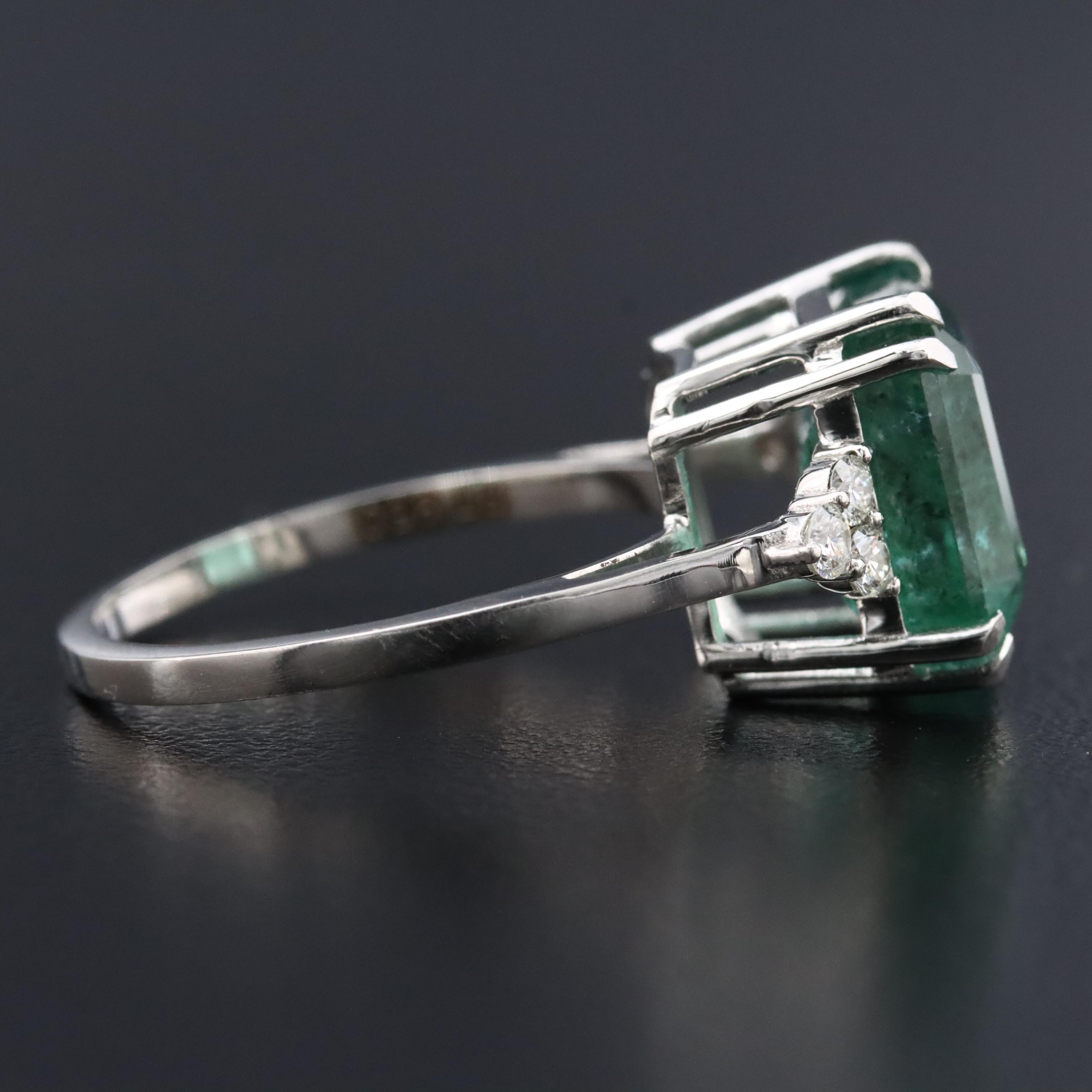 Platinum 5.50 CT Emerald and 0.18 CTW Diamond Ring