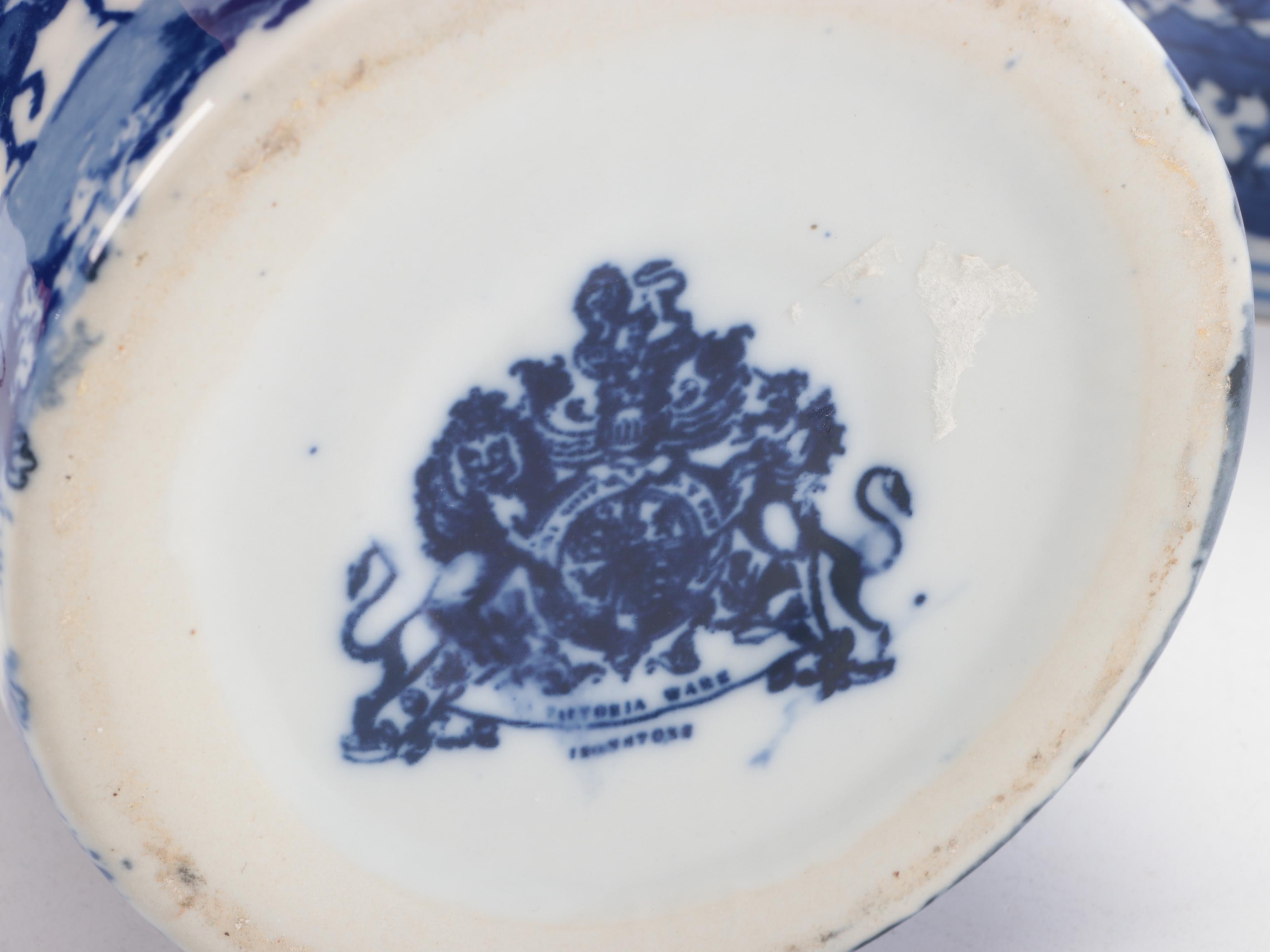 Two's Company with Other Blue and White Ceramic Jars and Vase