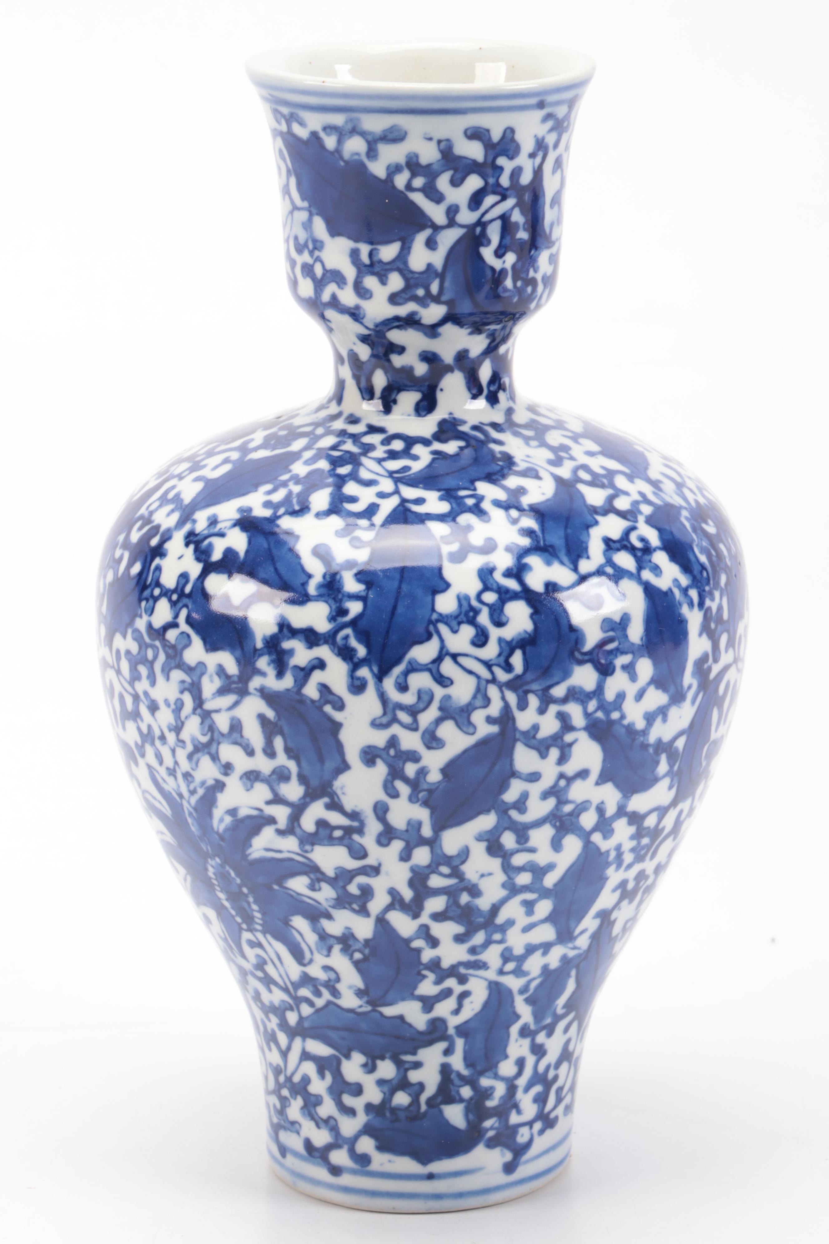 Two's Company with Other Blue and White Ceramic Jars and Vase