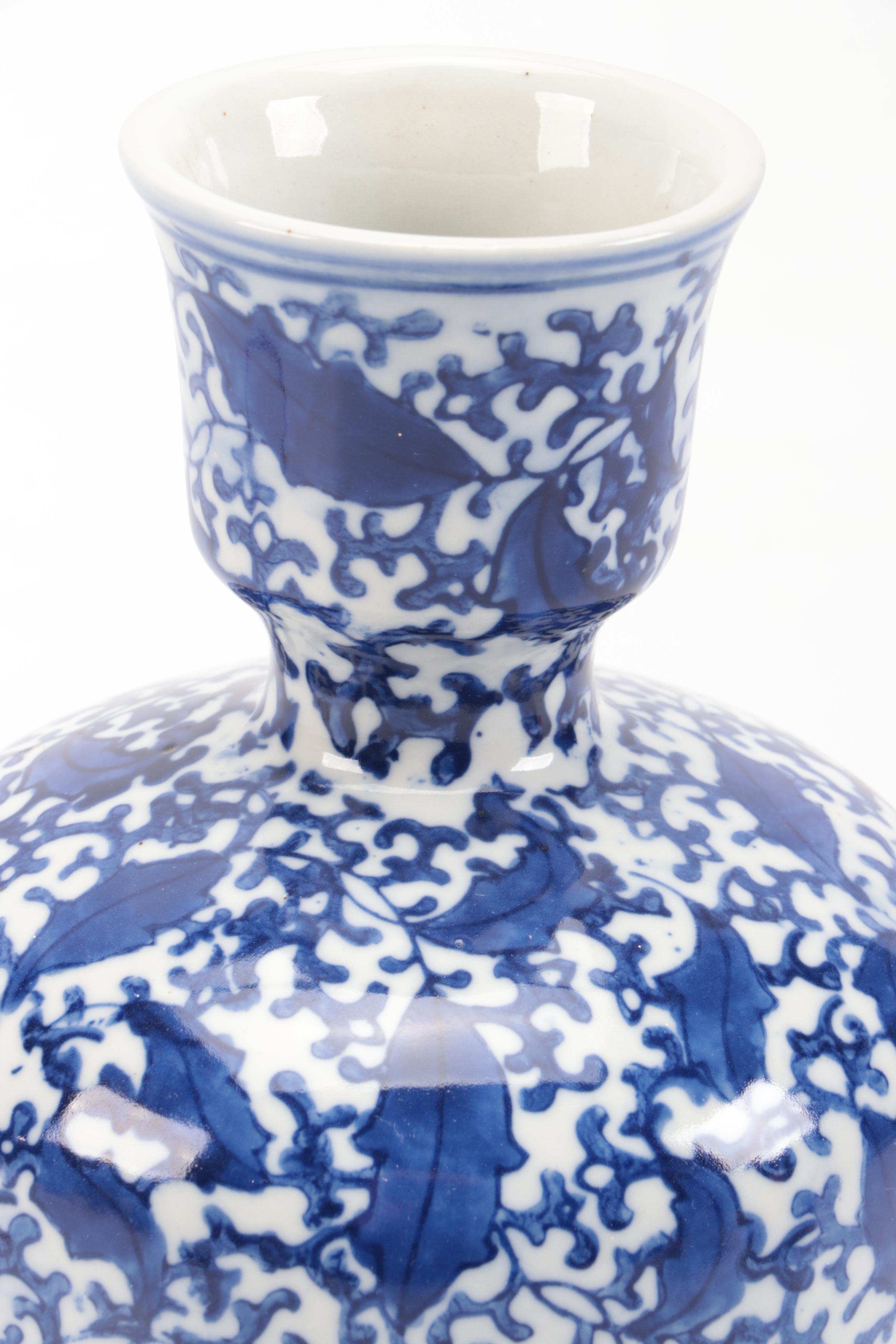 Two's Company with Other Blue and White Ceramic Jars and Vase