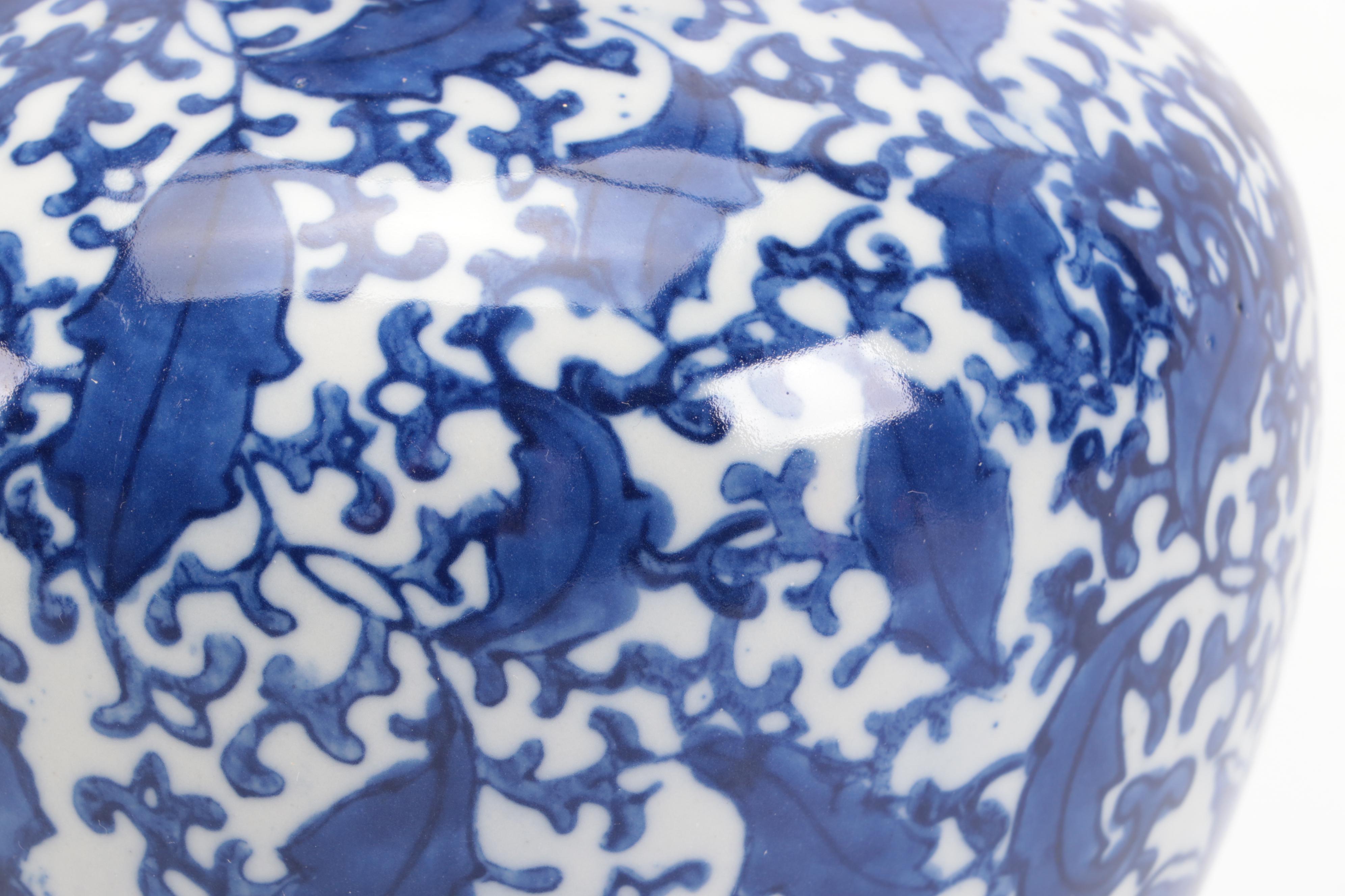 Two's Company with Other Blue and White Ceramic Jars and Vase