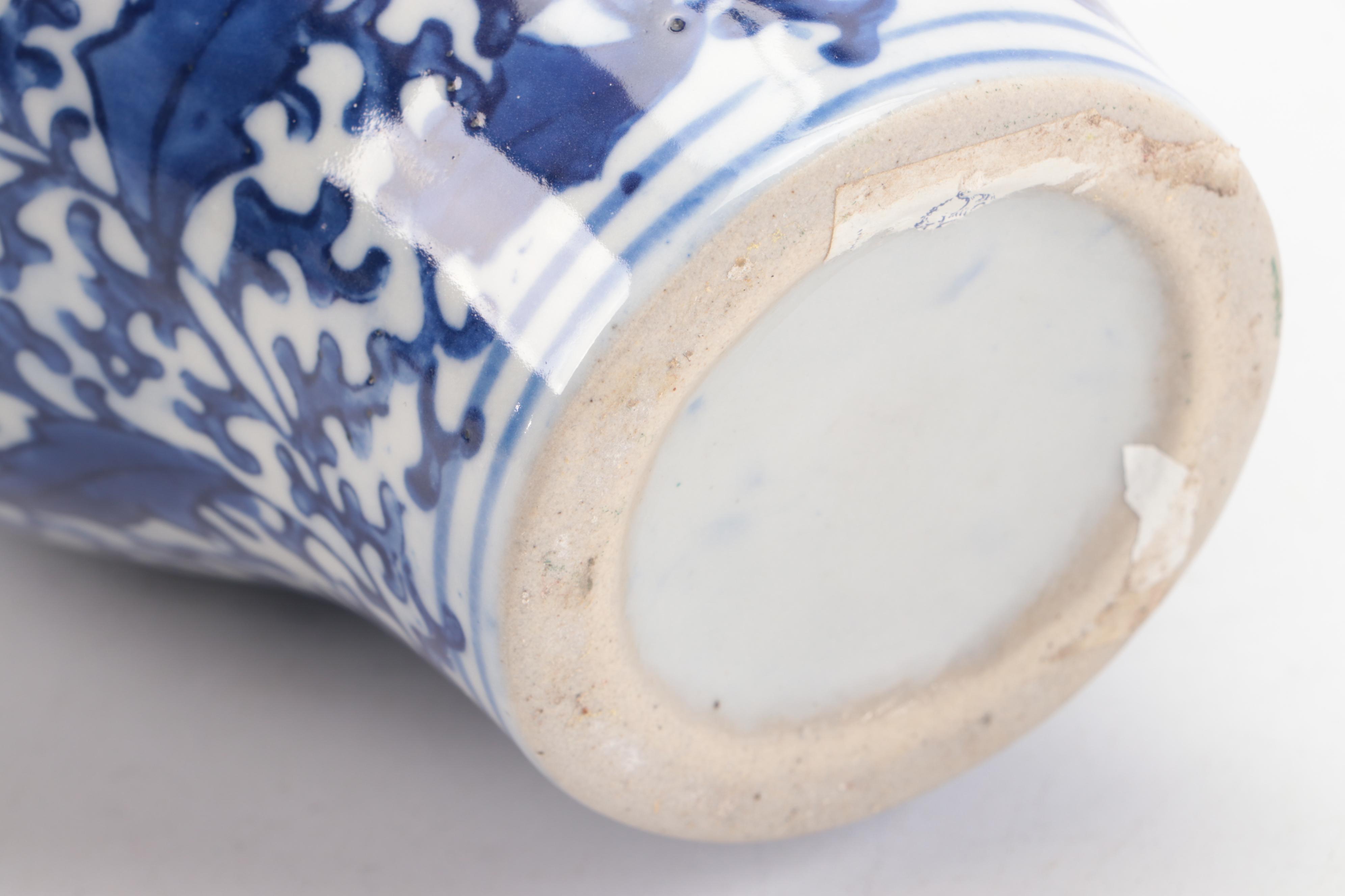 Two's Company with Other Blue and White Ceramic Jars and Vase