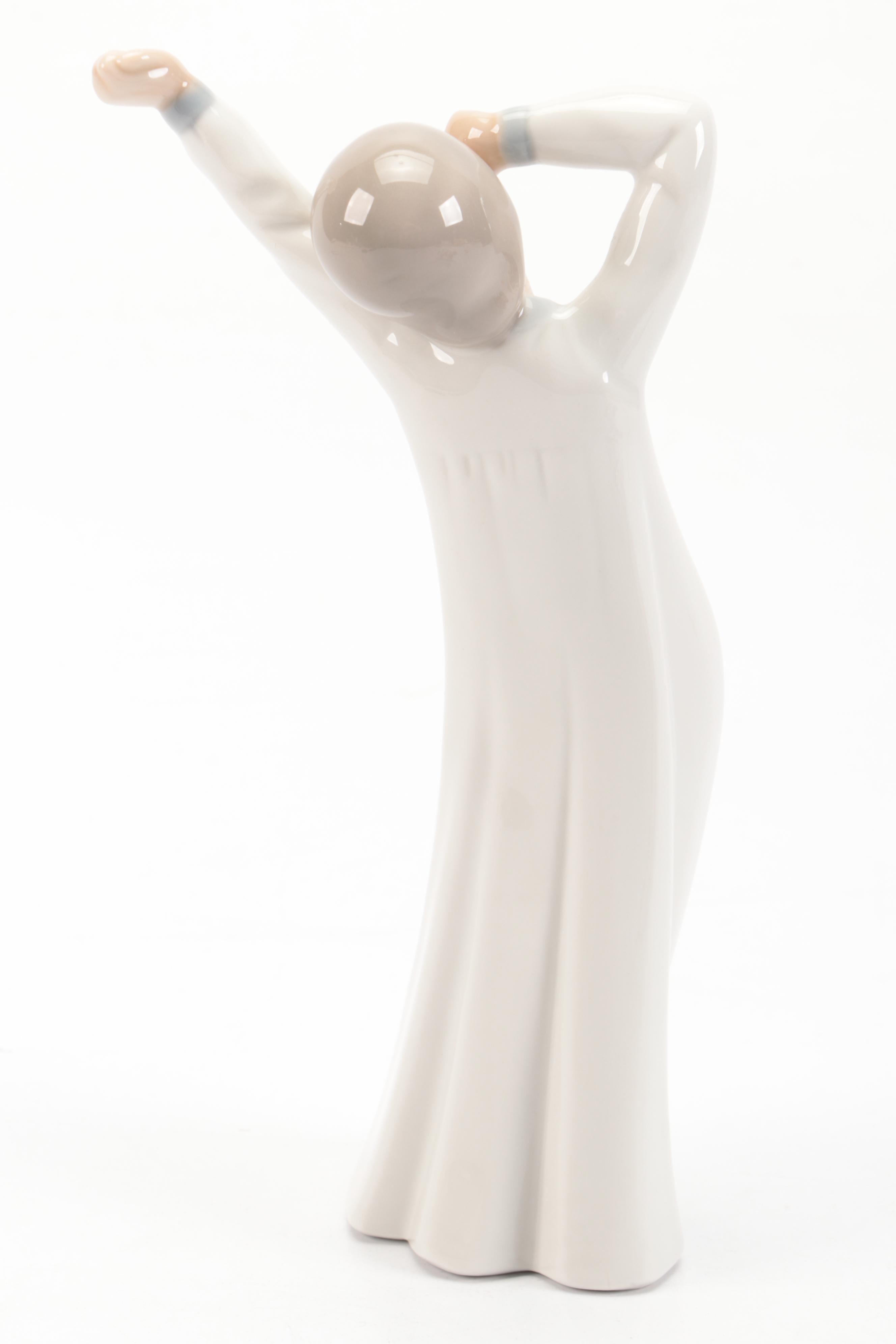 Nao by Lladró "Girl Yawning" with Bing & Grøndahl Porcelain Figurines