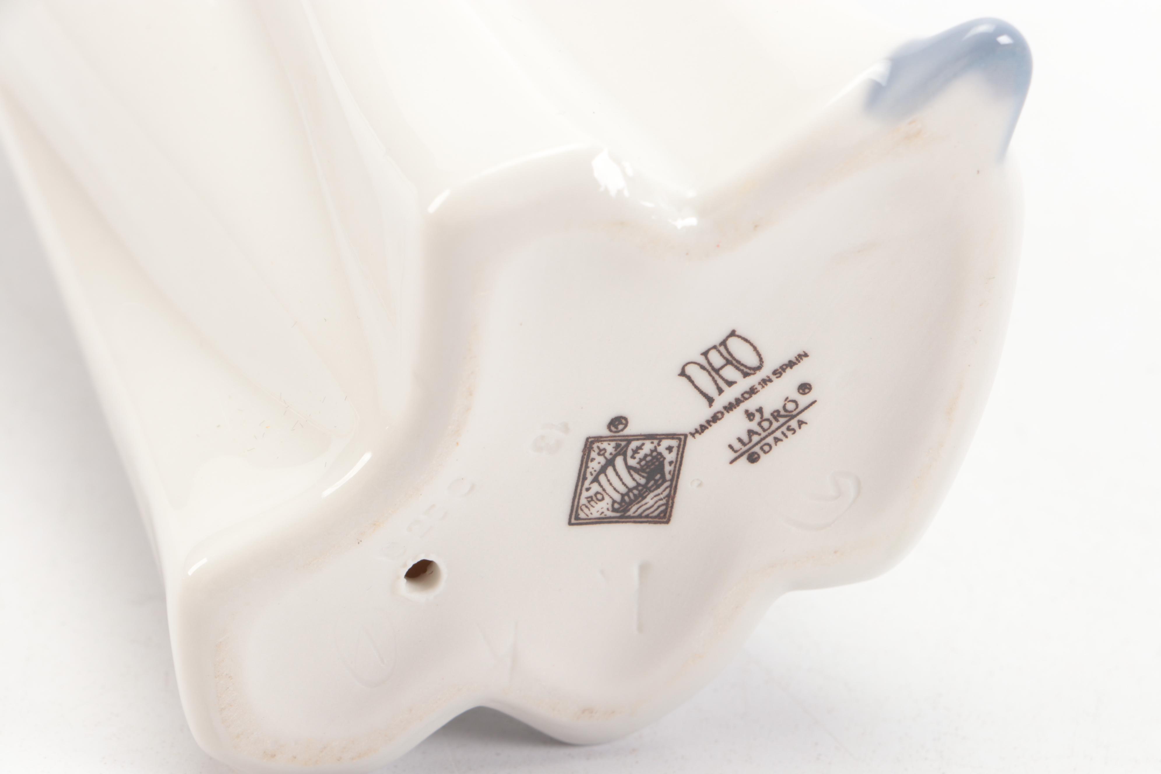 Nao by Lladró "Girl Yawning" with Bing & Grøndahl Porcelain Figurines