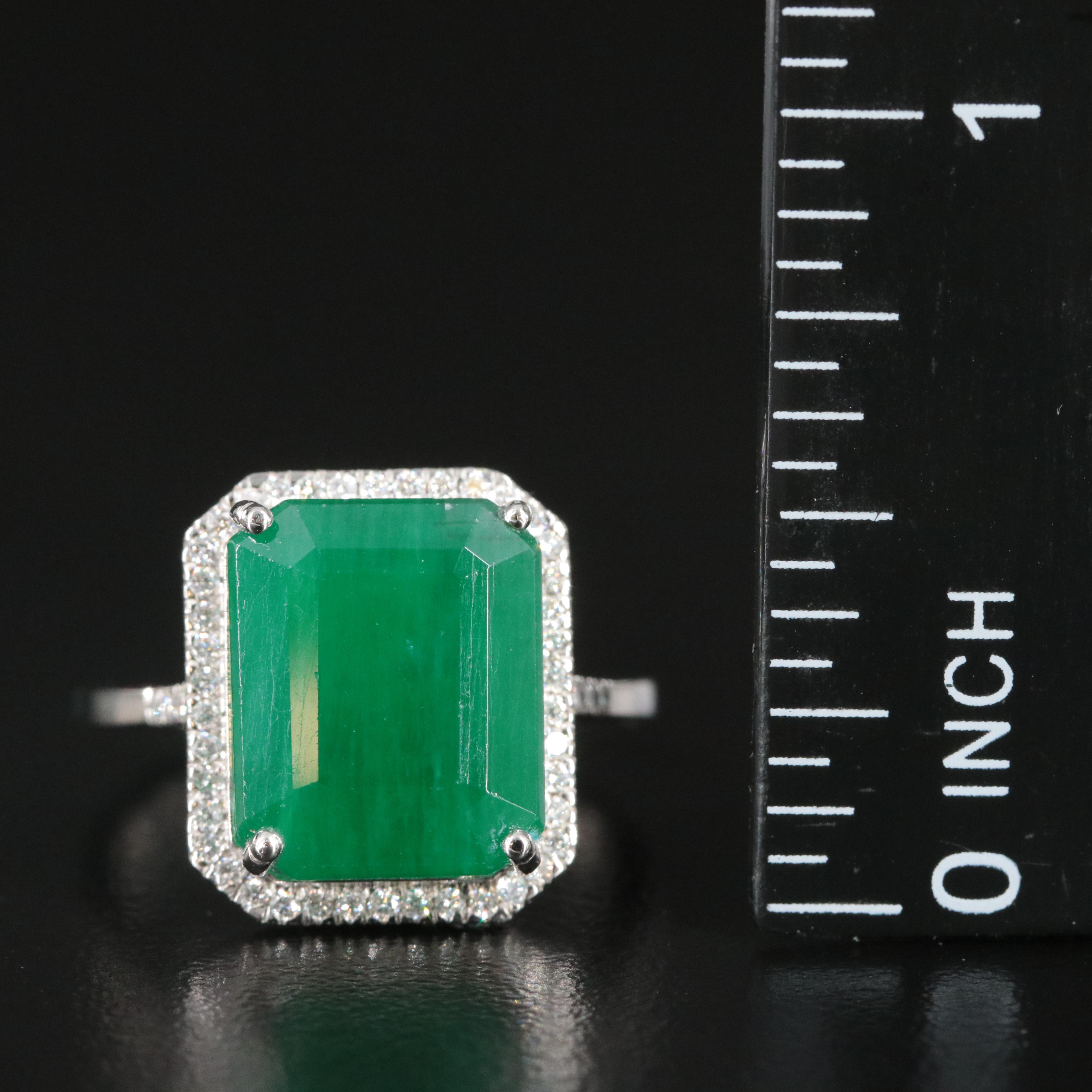 Platinum 7.33 CT Emerald and 0.18 CTW Diamond Ring