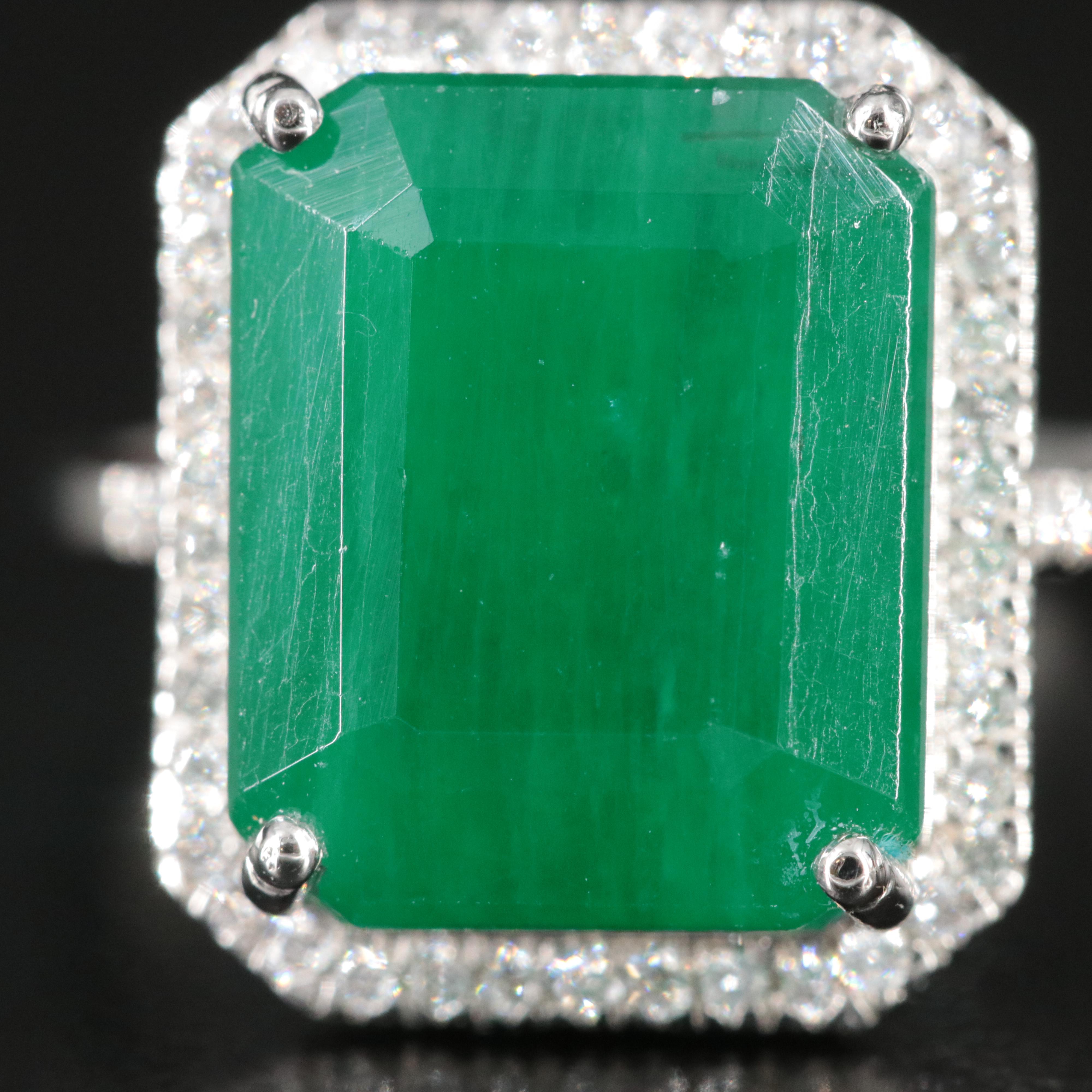 Platinum 7.33 CT Emerald and 0.18 CTW Diamond Ring
