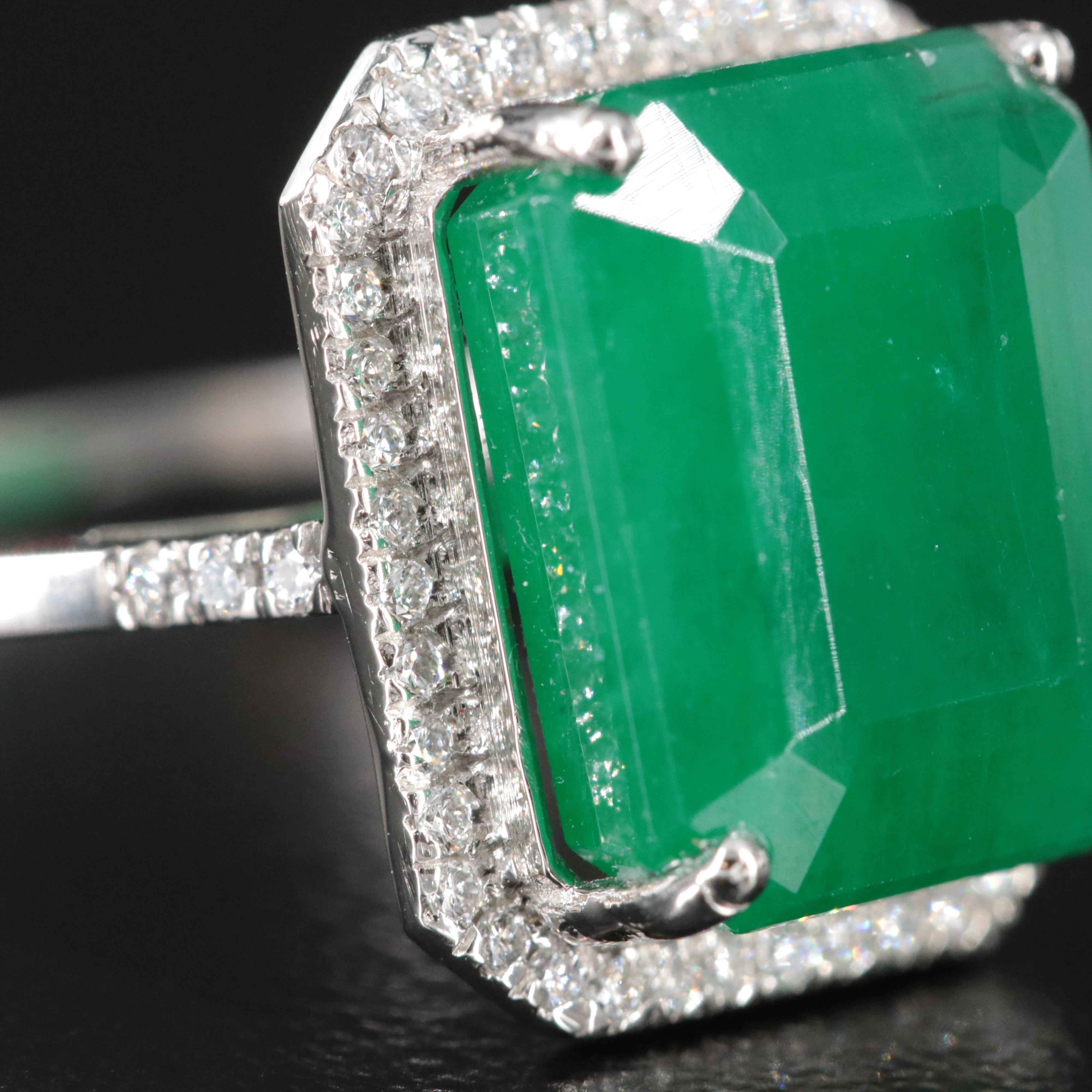 Platinum 7.33 CT Emerald and 0.18 CTW Diamond Ring
