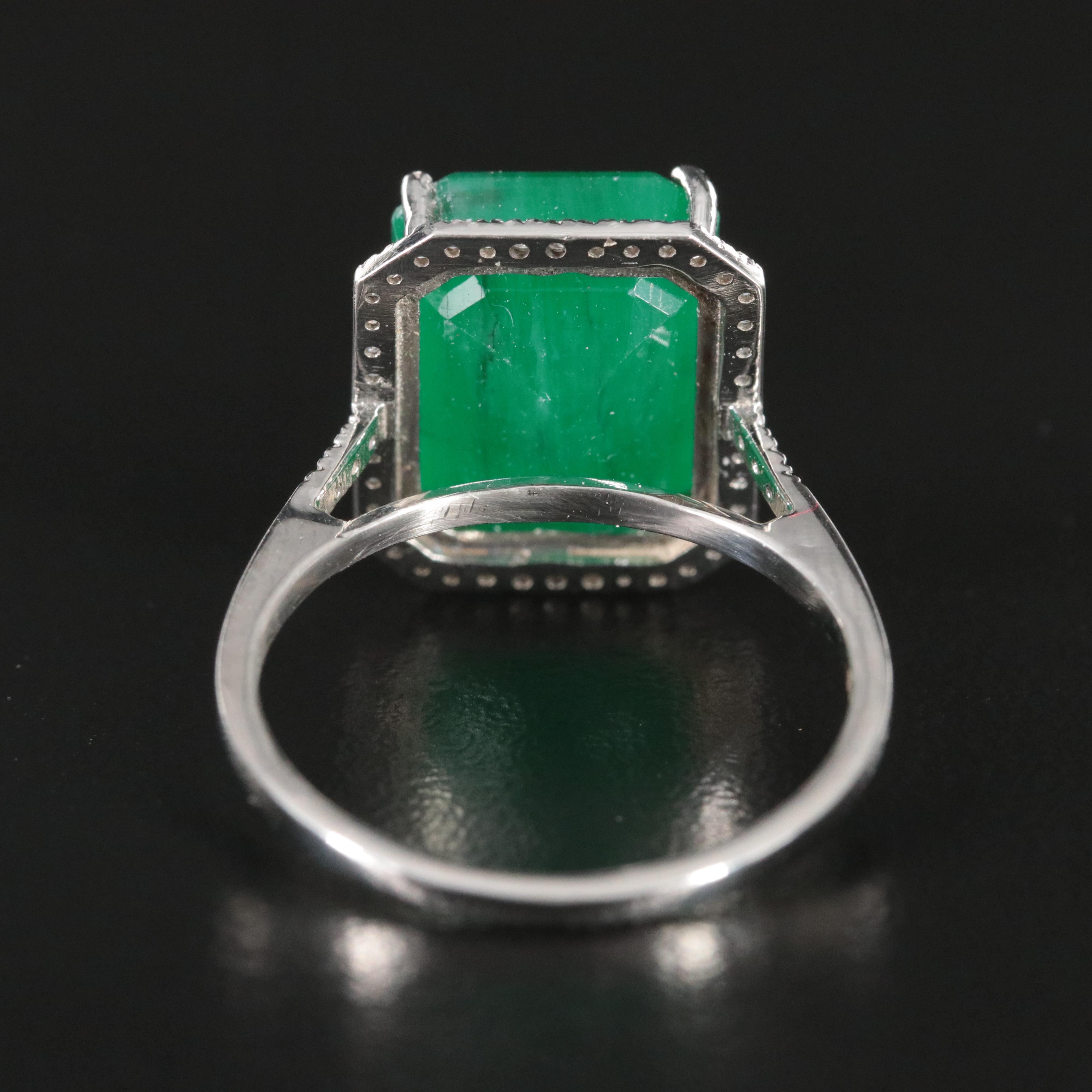 Platinum 7.33 CT Emerald and 0.18 CTW Diamond Ring