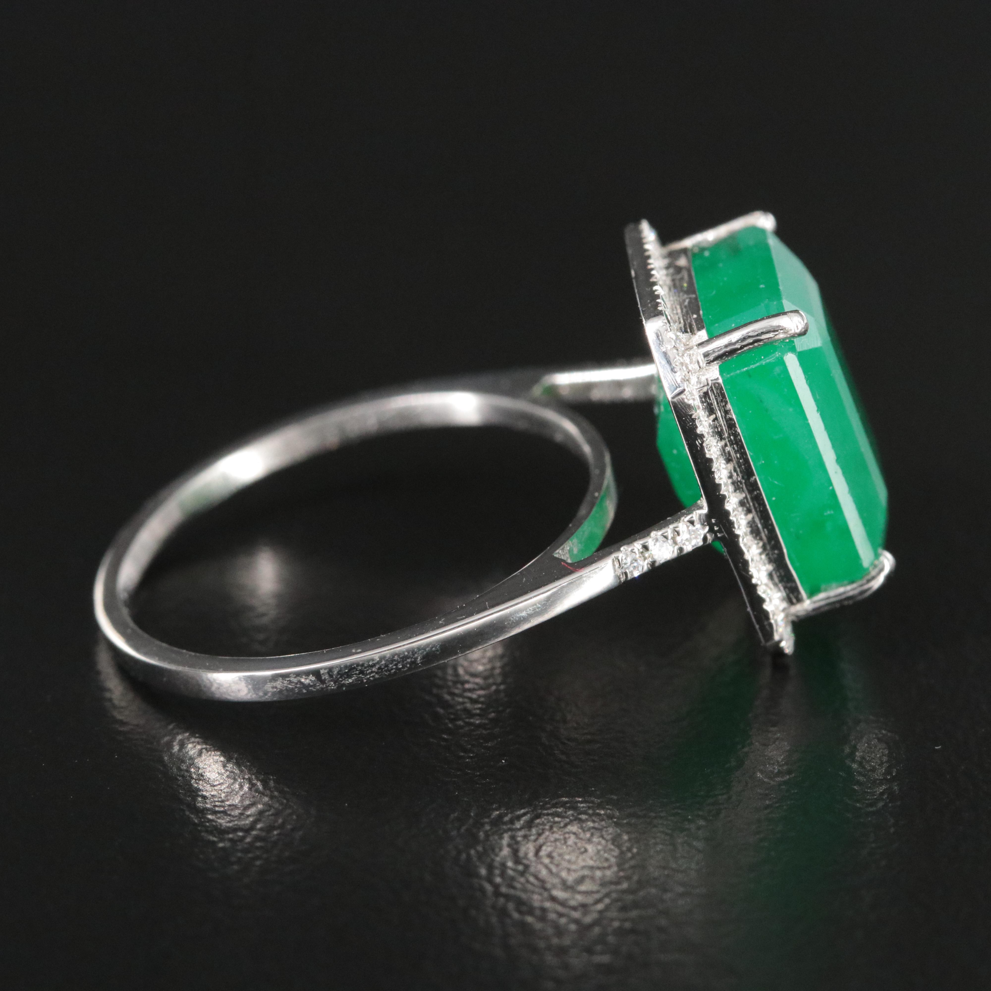 Platinum 7.33 CT Emerald and 0.18 CTW Diamond Ring