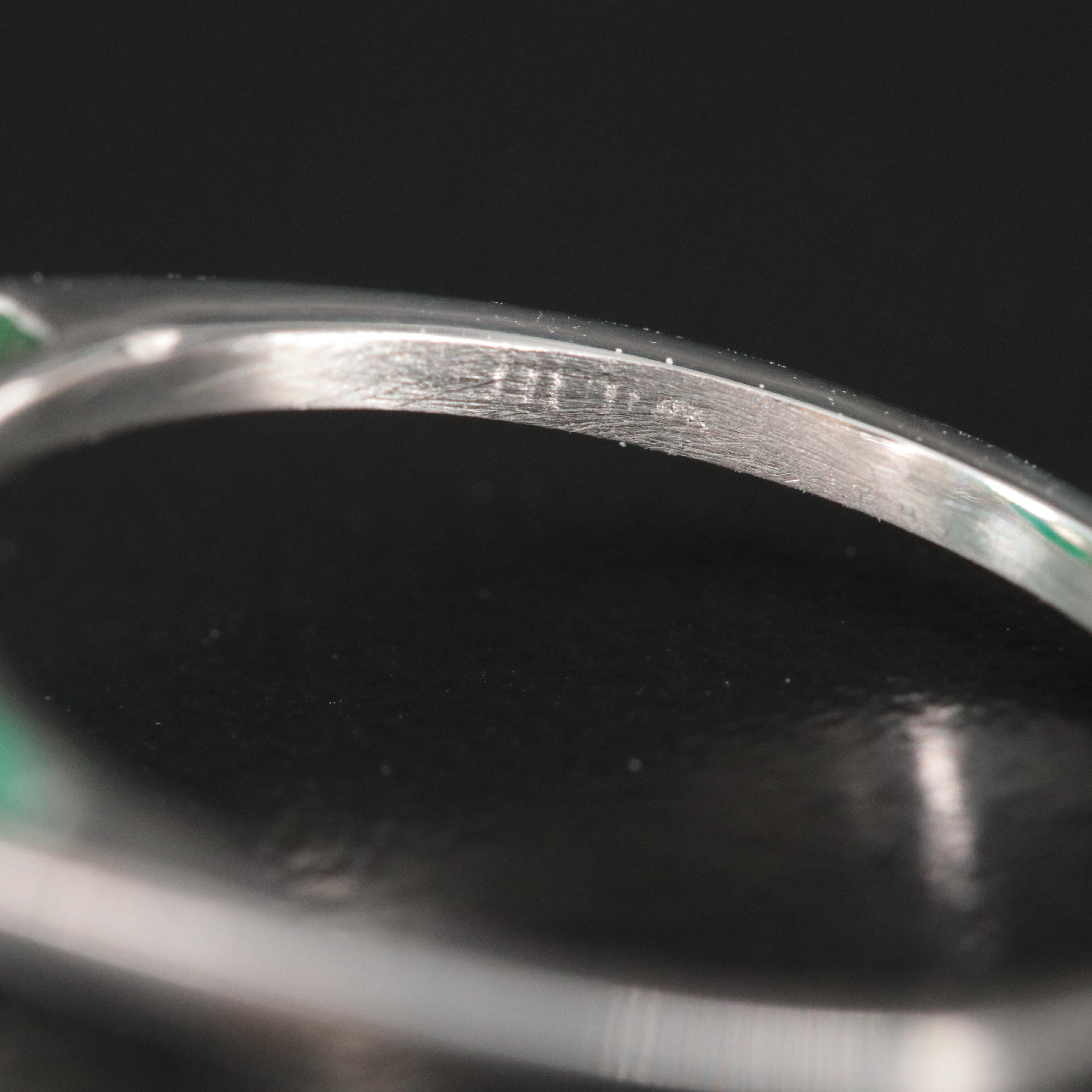 Platinum 7.33 CT Emerald and 0.18 CTW Diamond Ring