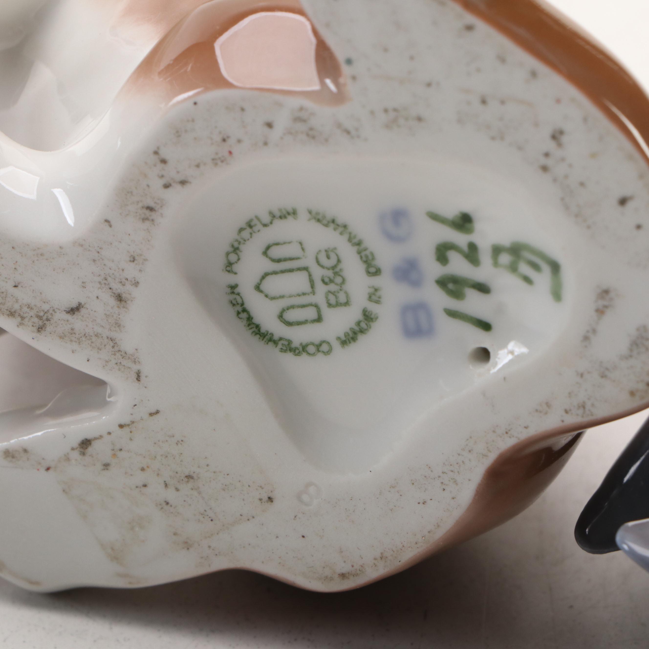 Bing & Grøndahl "St. Bernard Puppy" and Royal Copenhagen "Robin" Figurines