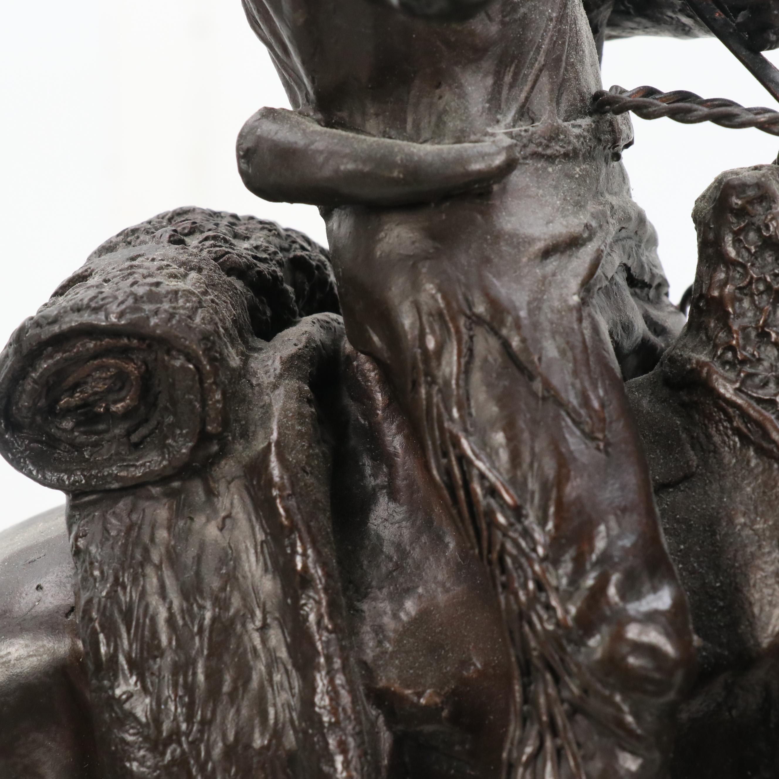 After Frederic Remington Patinated Bronze Sculpture "Hunter Trail"