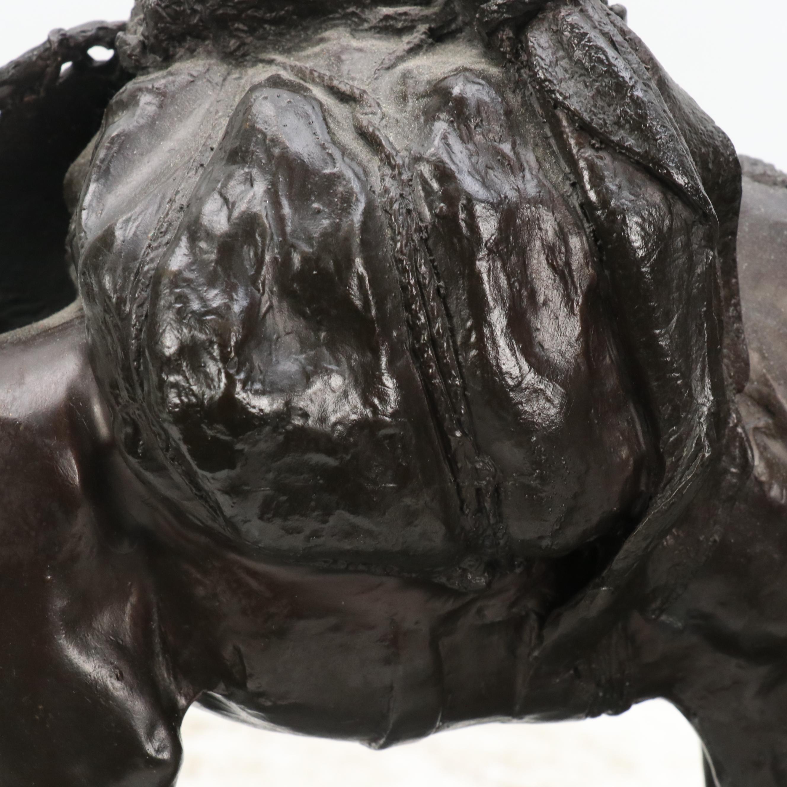 After Frederic Remington Patinated Bronze Sculpture "Hunter Trail"