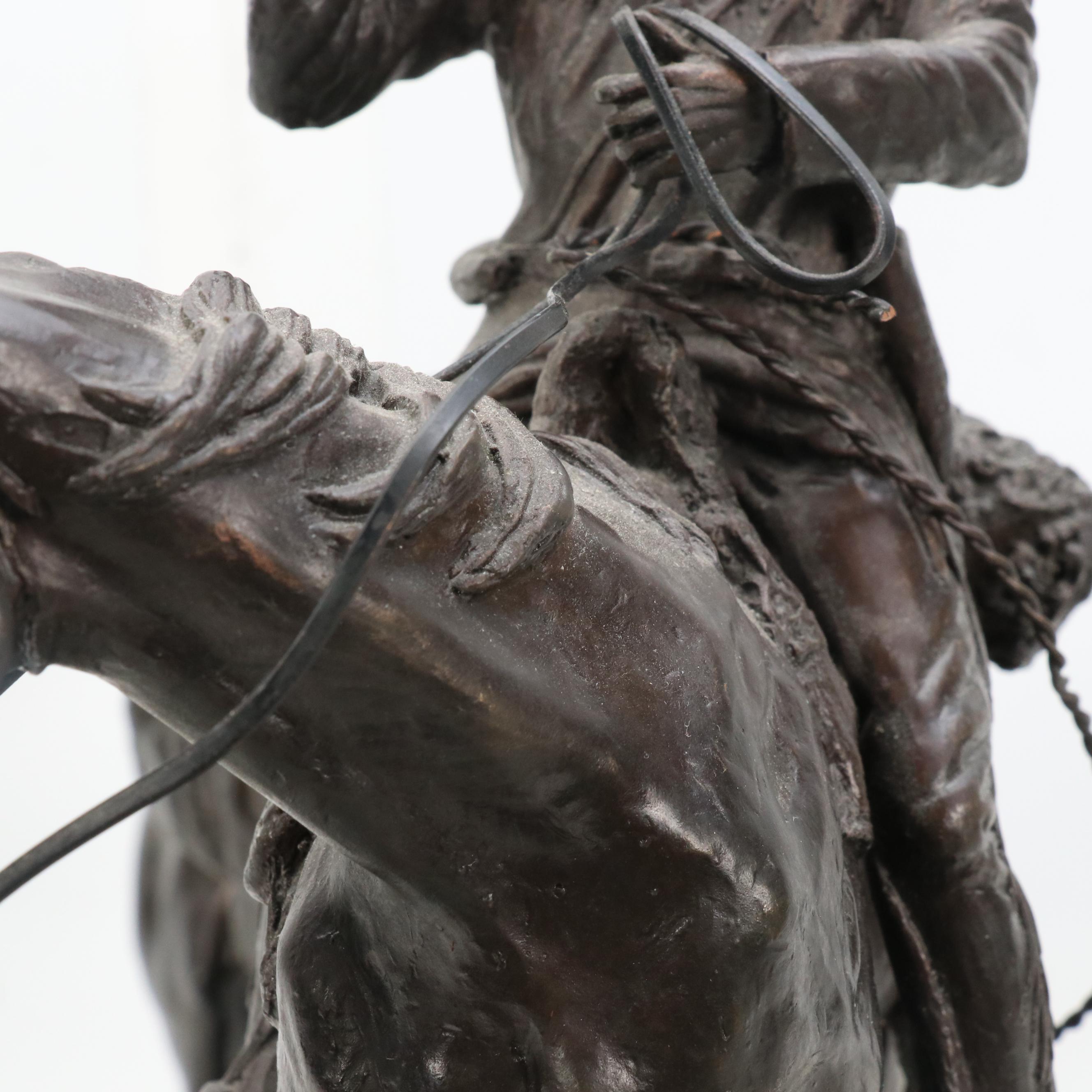 After Frederic Remington Patinated Bronze Sculpture "Hunter Trail"