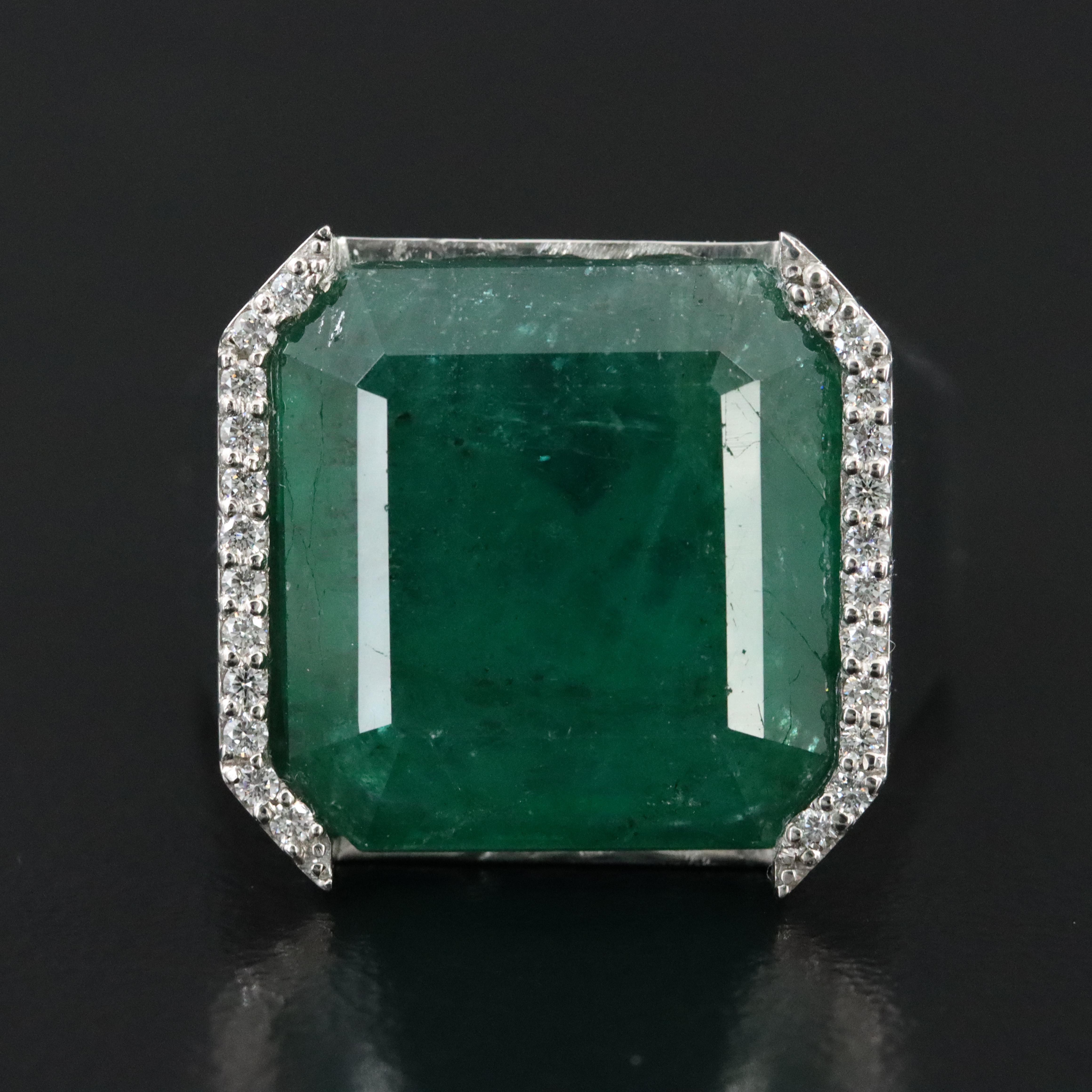 Platinum 15.45 CT Emerald and 0.15 CTW Diamond Ring