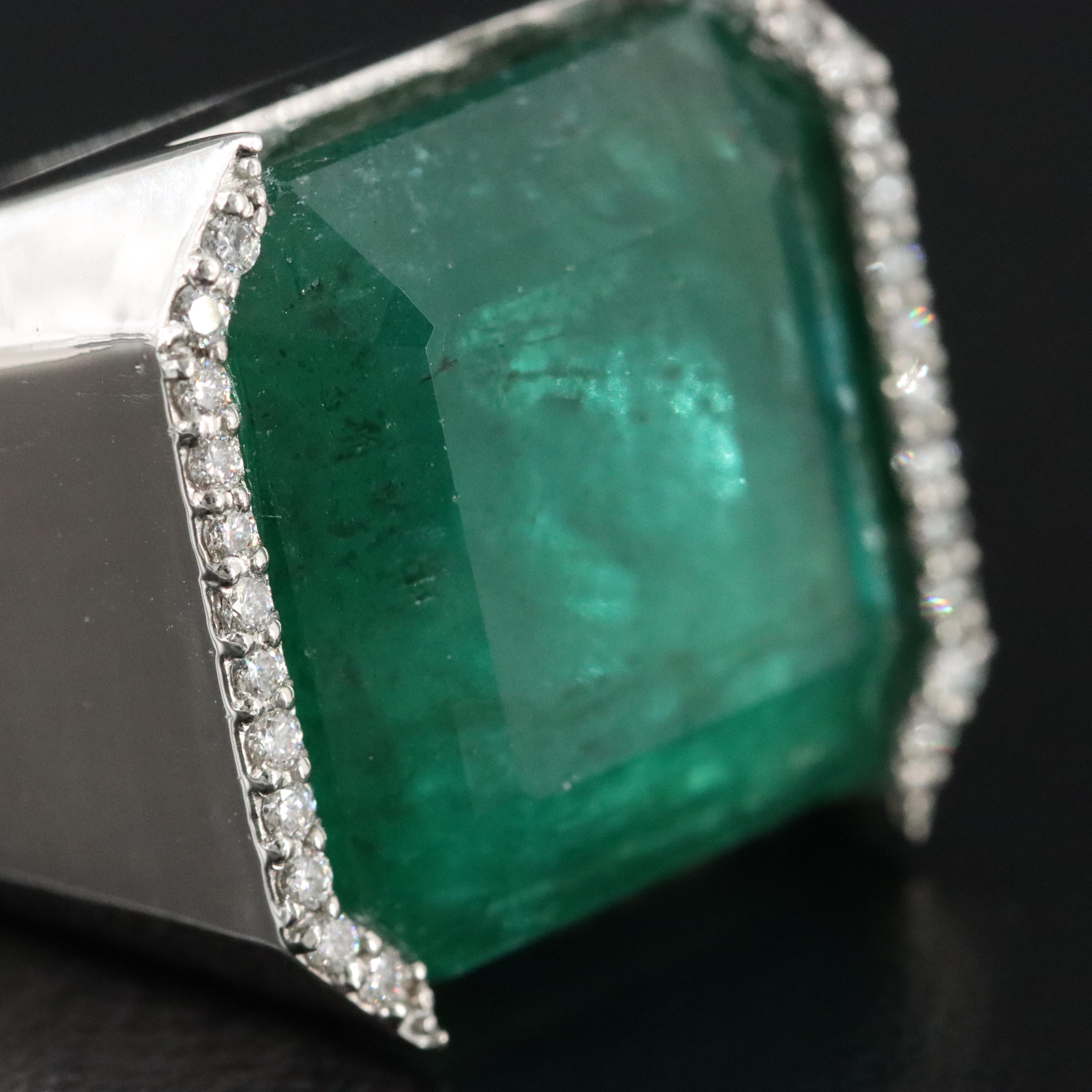 Platinum 15.45 CT Emerald and 0.15 CTW Diamond Ring