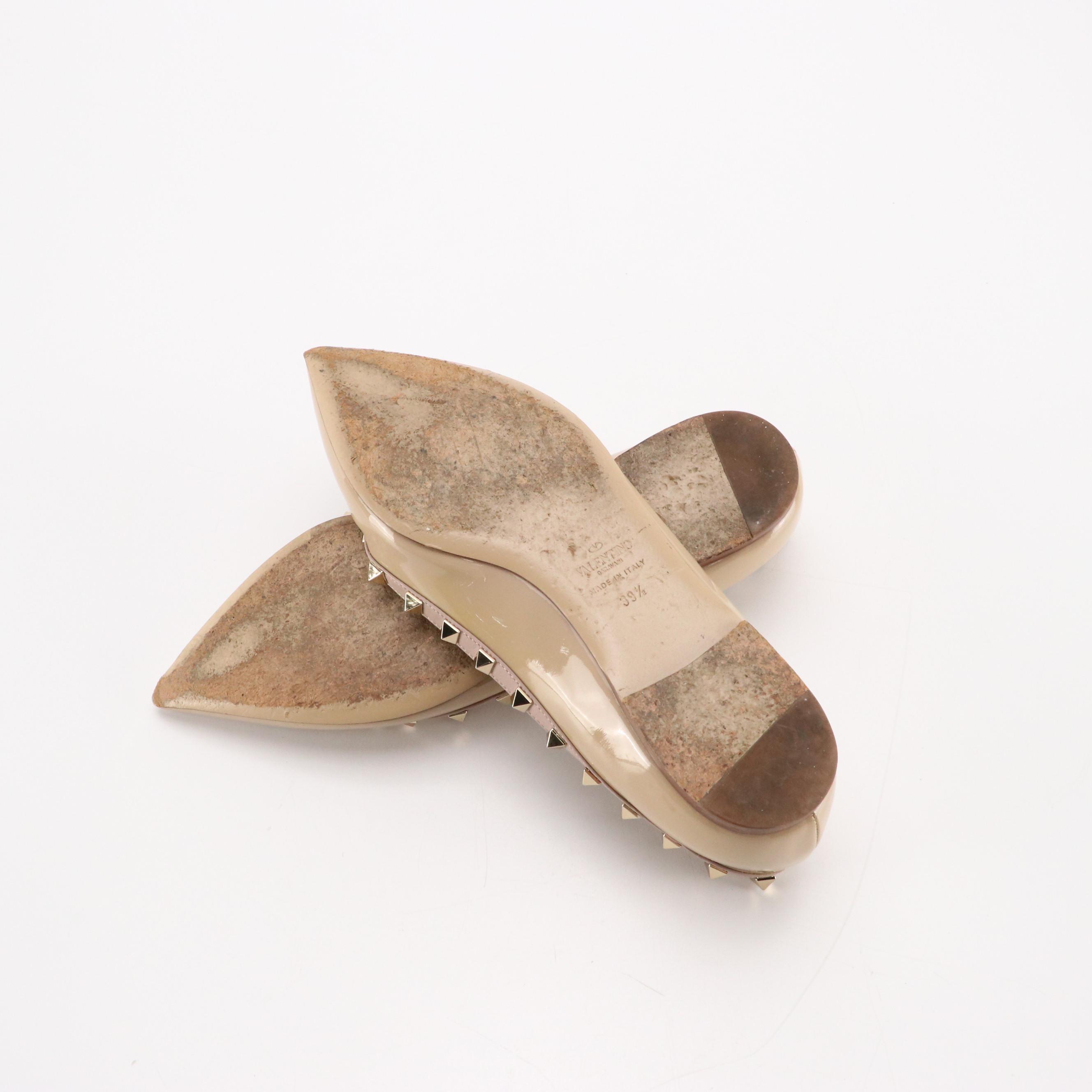 Valentino Garavani Pointed-Toe Rockstud Flats in Beige Patent Leather