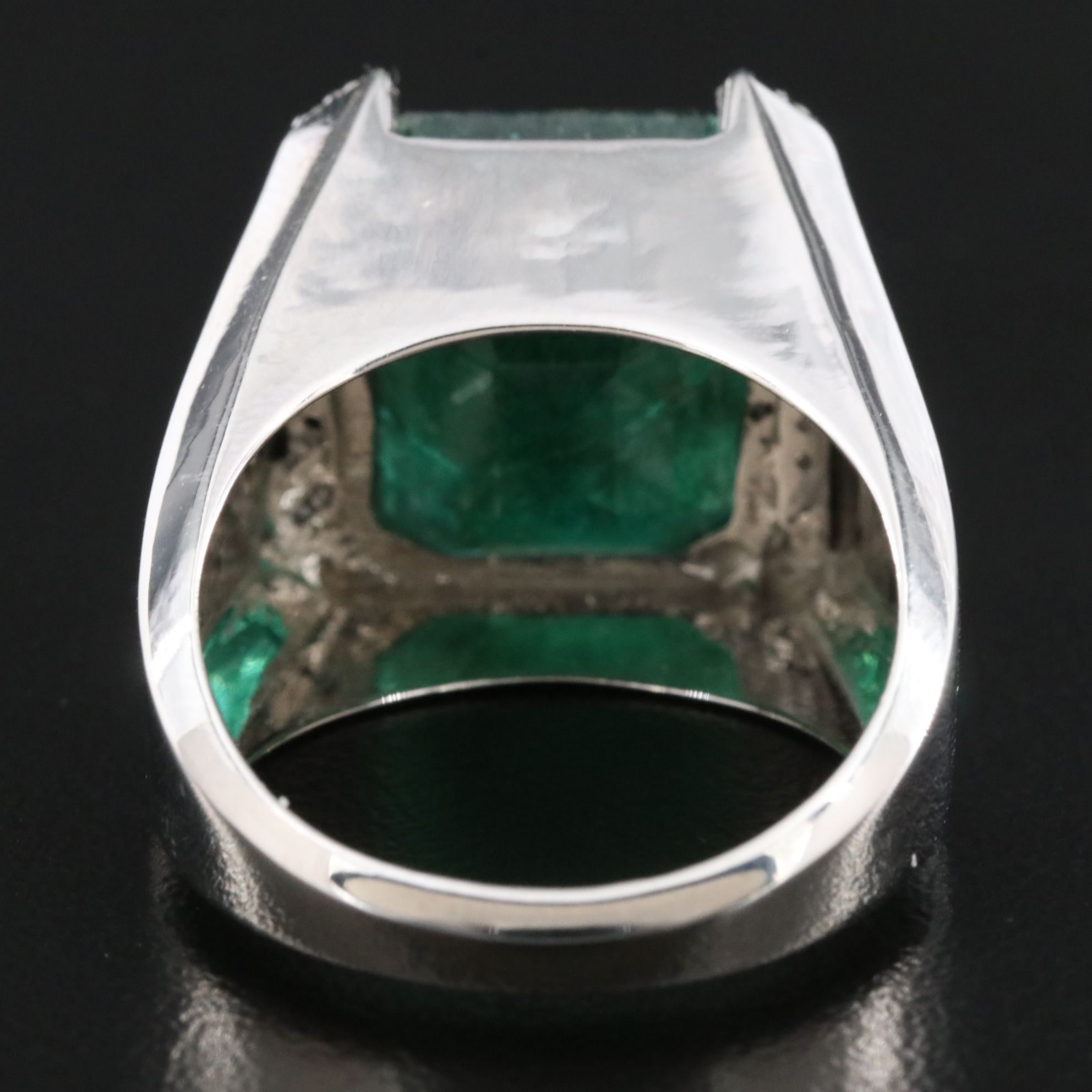 Platinum 15.50 CT Emerald and 0.17 CTW Diamond Ring